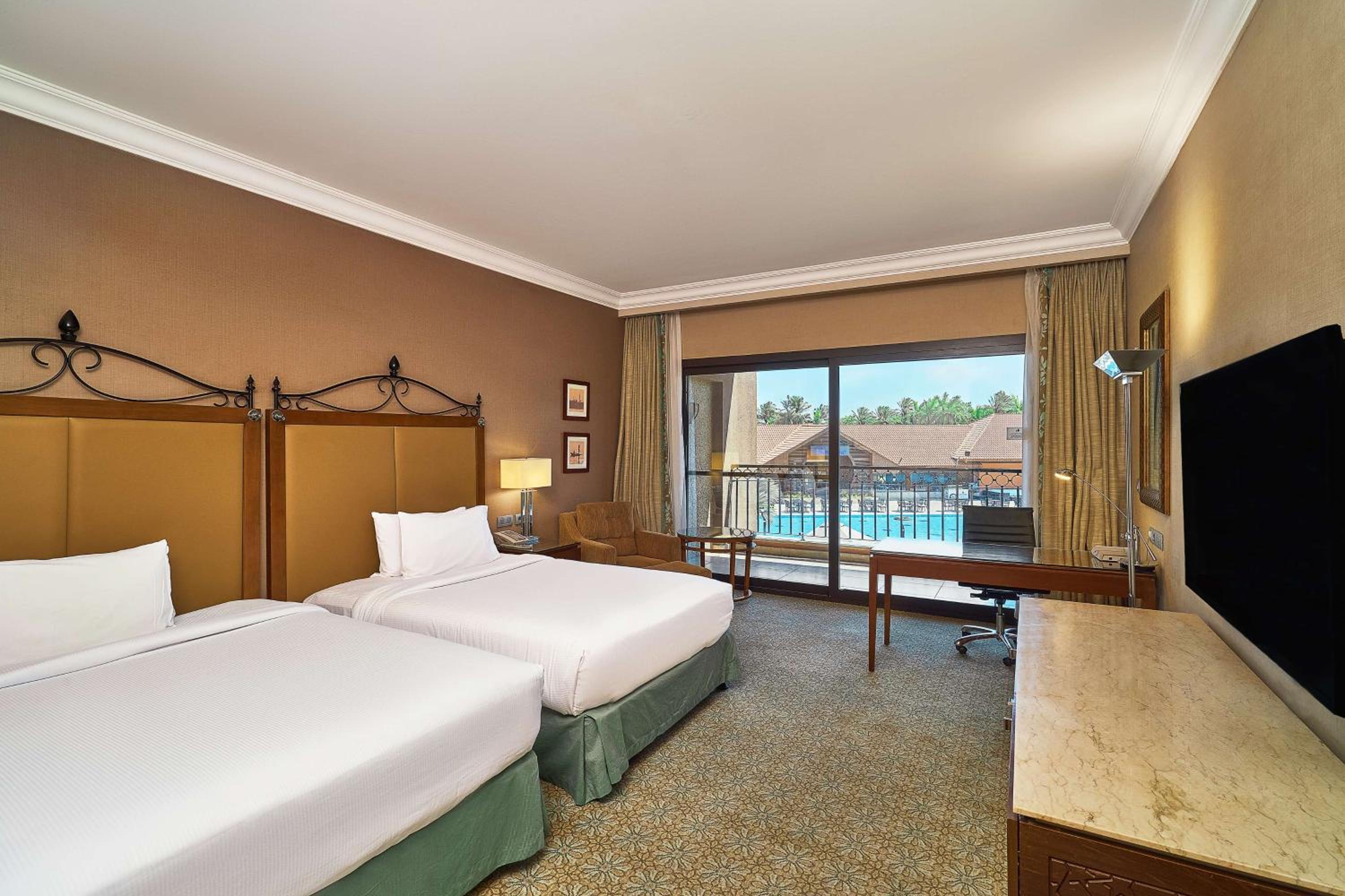 Deluxe Twin Room with Pool View thumbnail 6