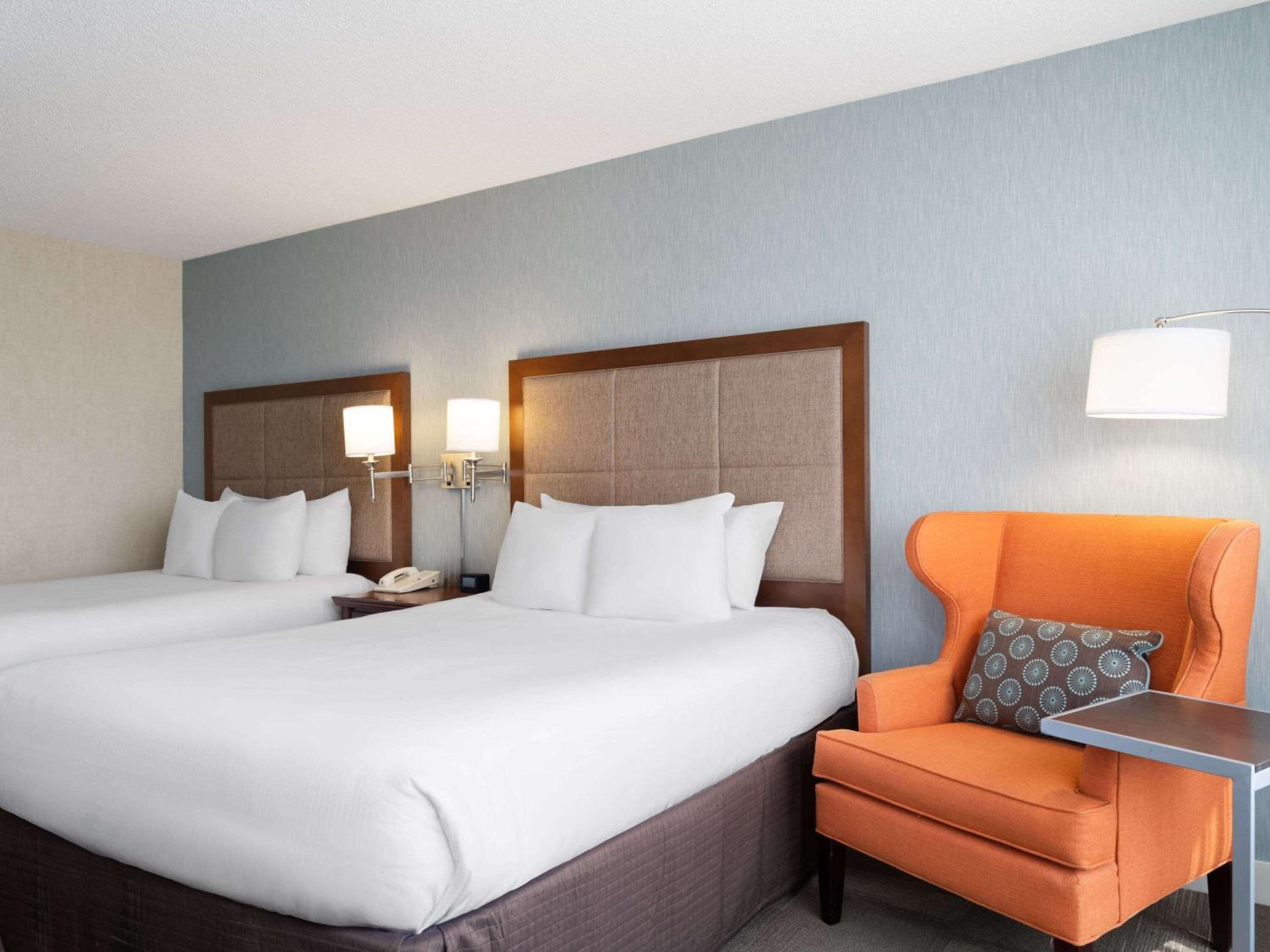 Queen Room with Two Queen Beds - Hearing Accessible/Non-Smoking photo 1