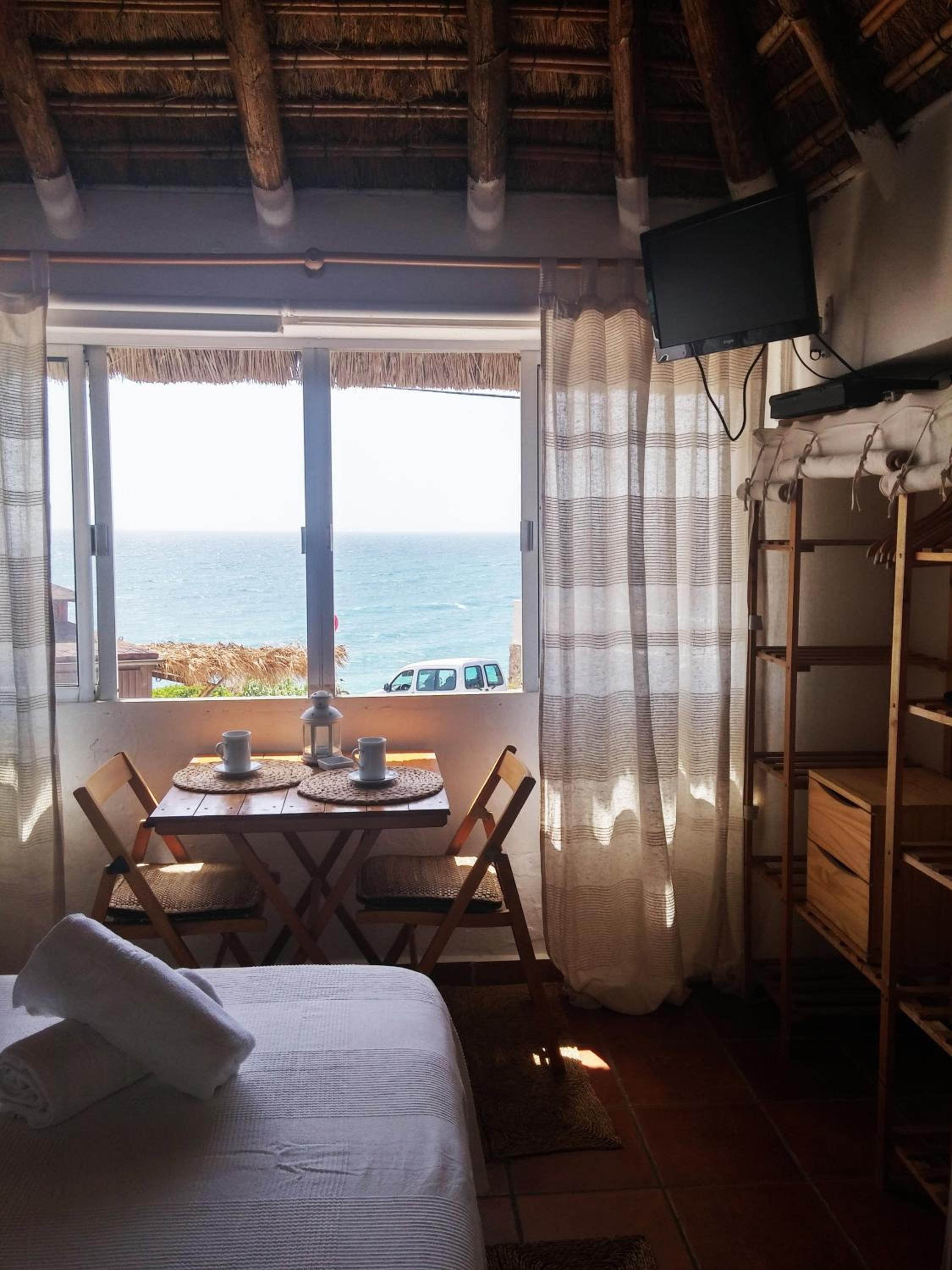 Bungalow con vista al mar