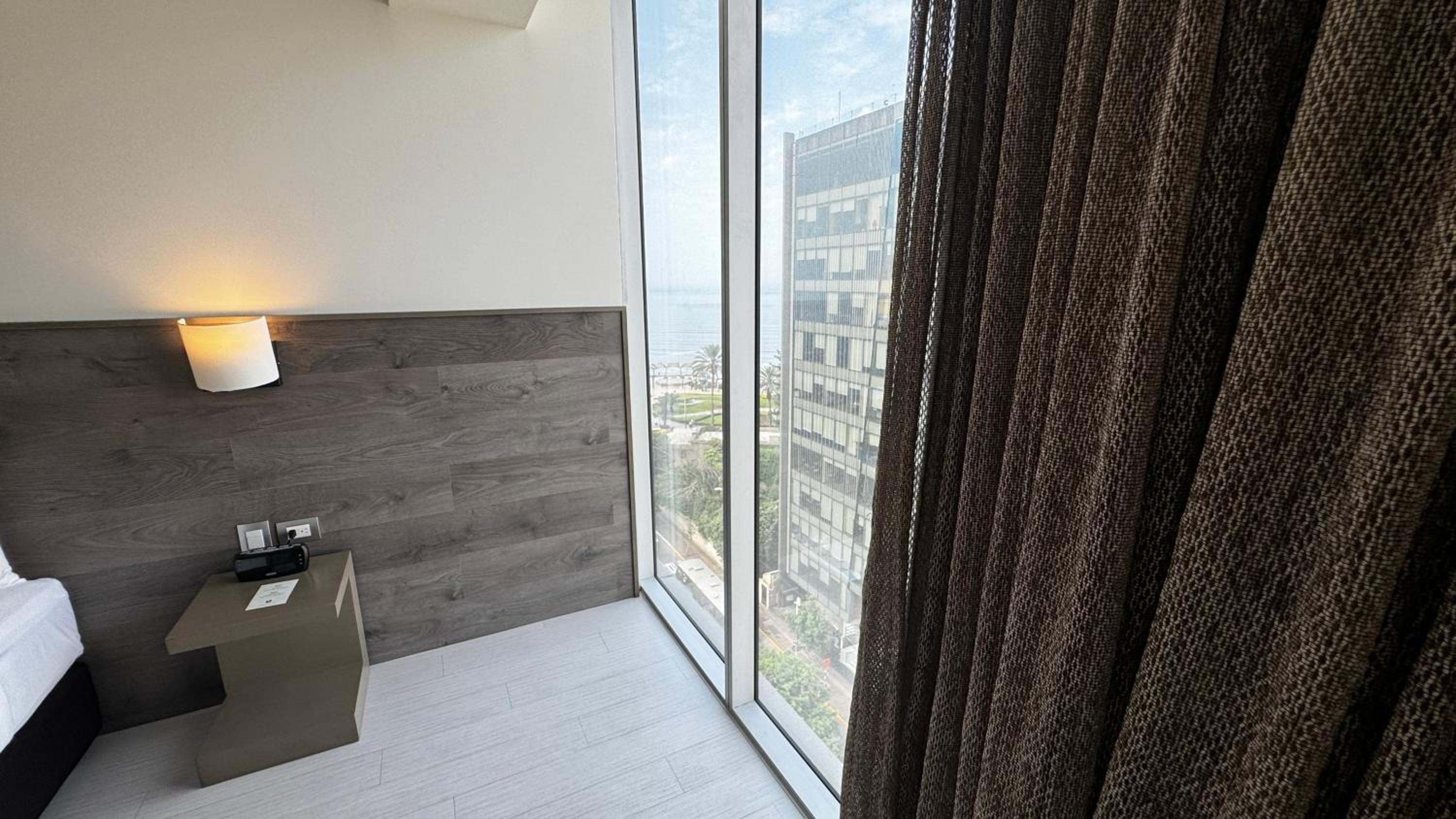 Junior Queen Suite with Partial Ocean View photo 3