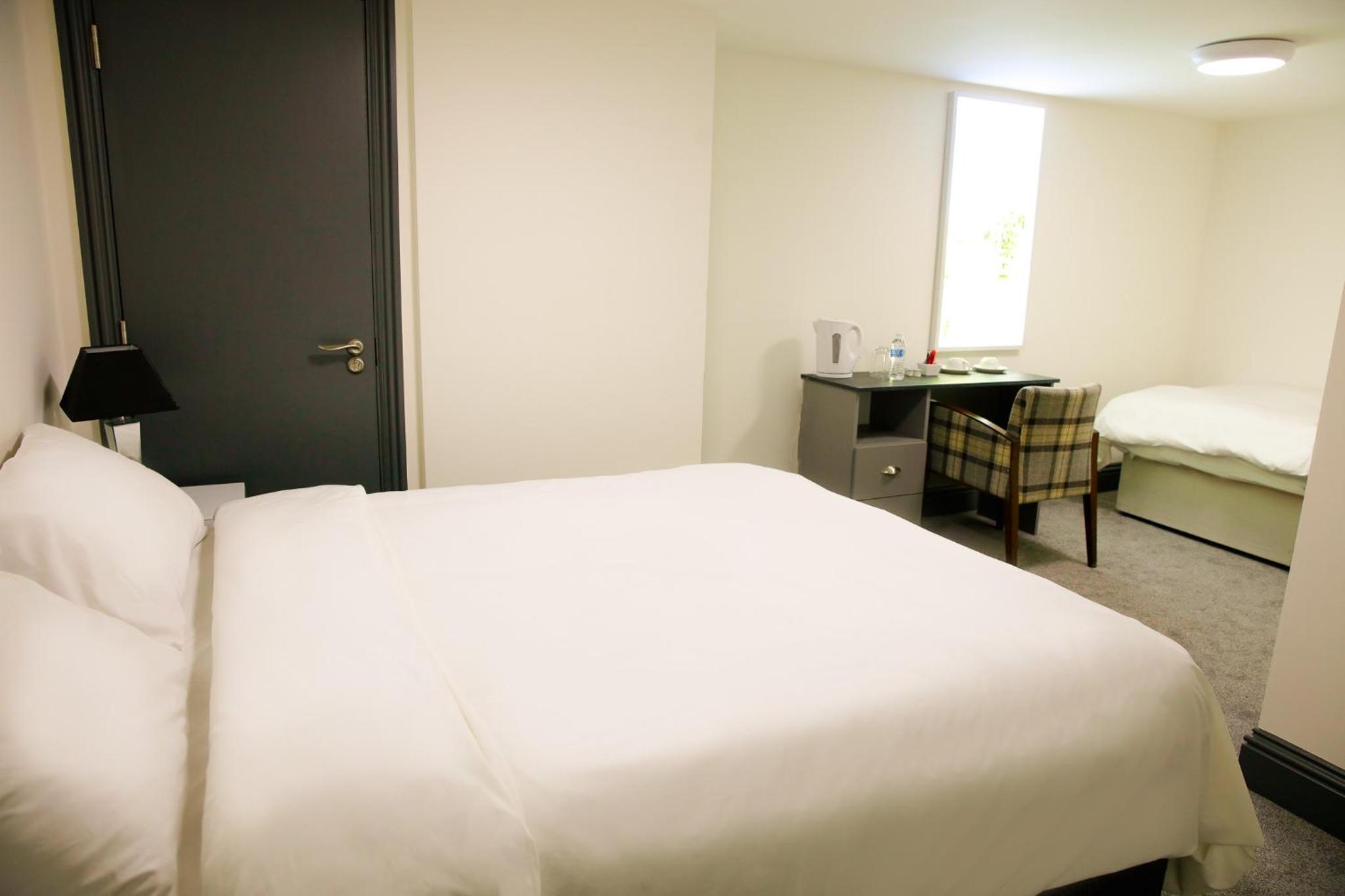Deluxe Triple Room - Photo 1