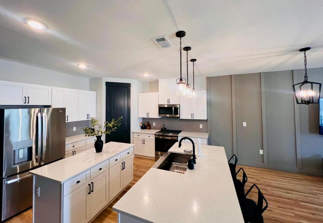 Three-Bedroom House - Photo 27