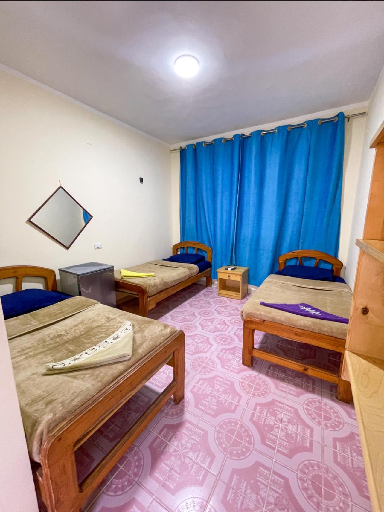Economy Triple Room photo 3
