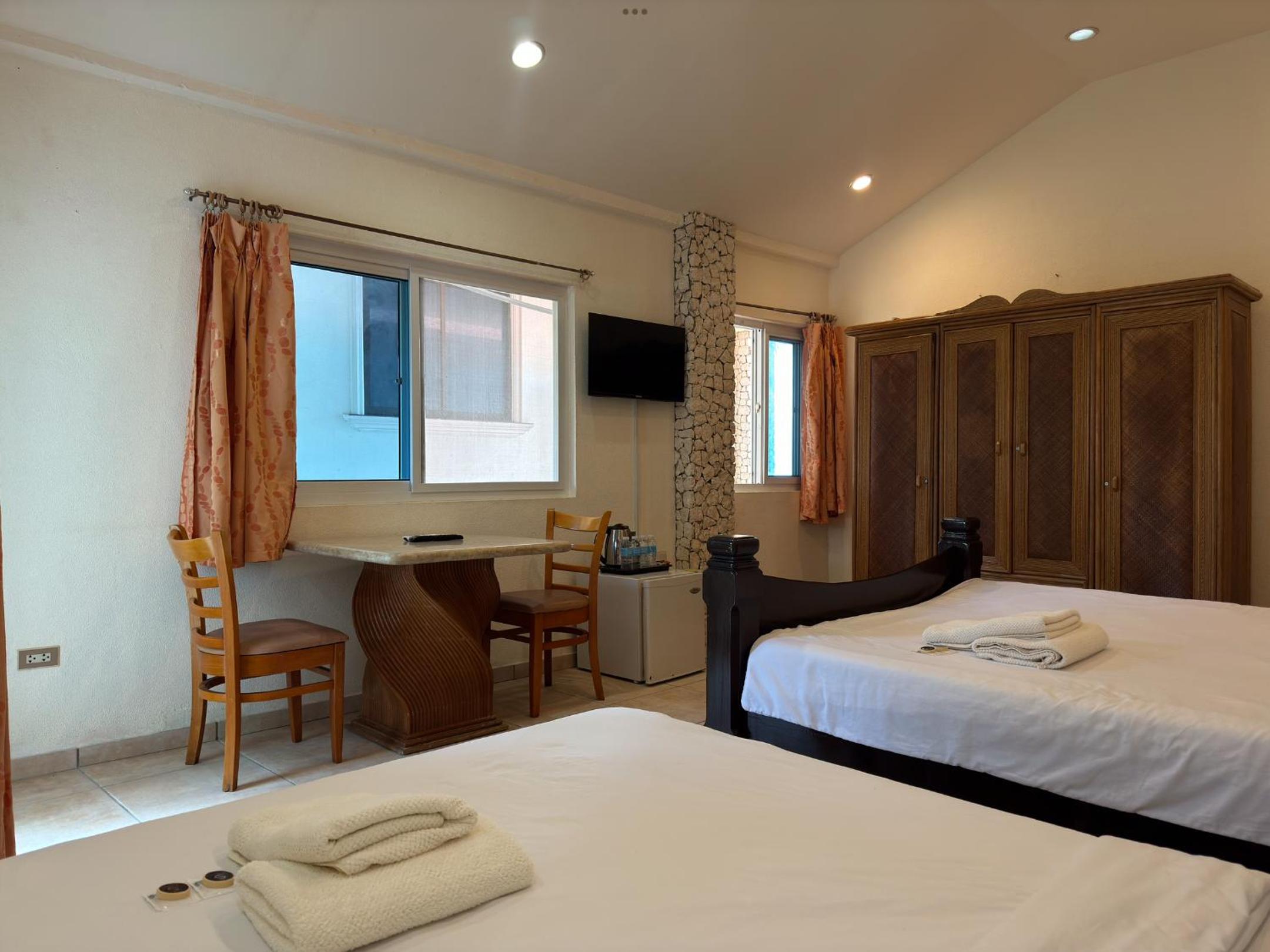 Quadruple Room with Balcony photo 2