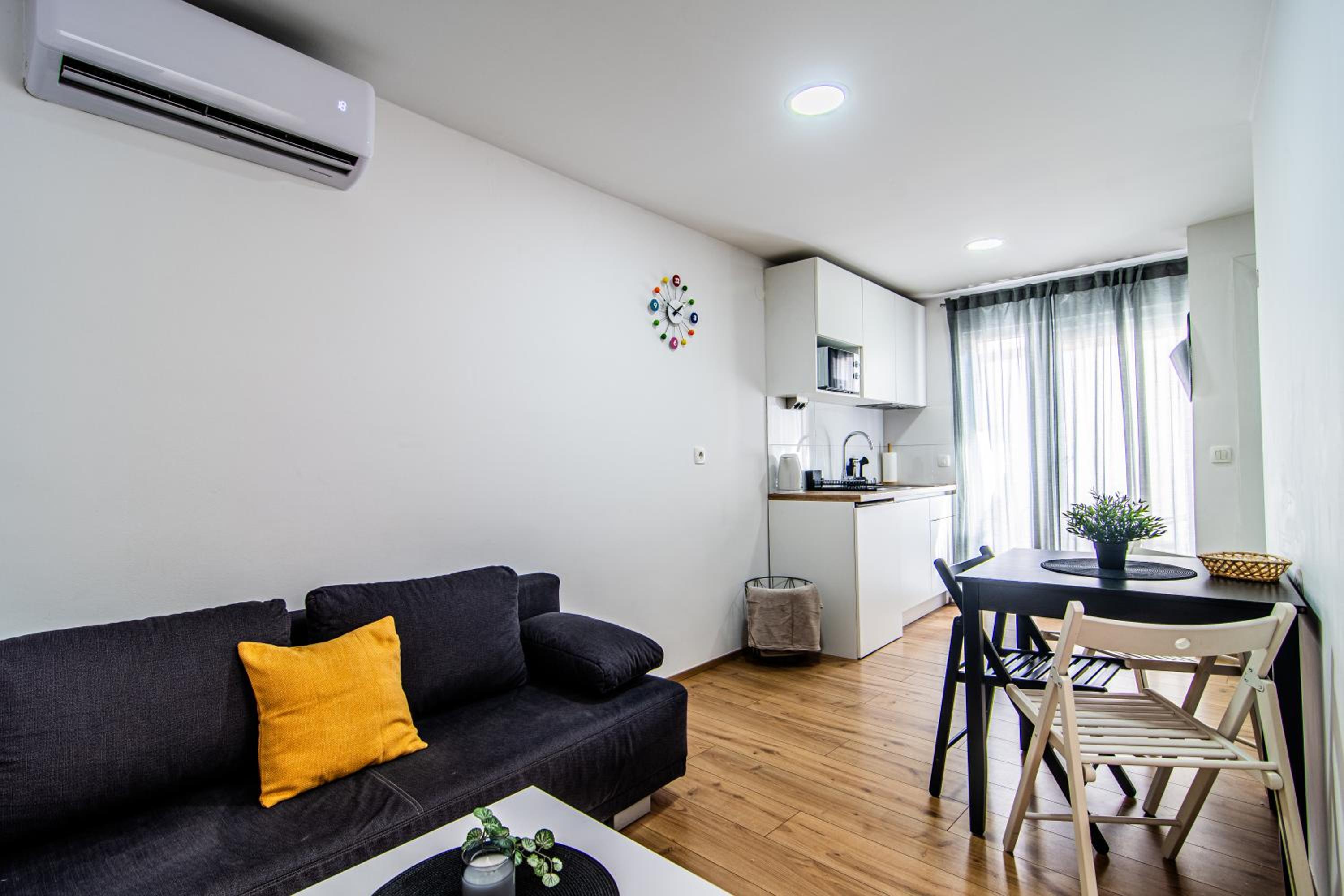 One-Bedroom Apartment with Balcony and City View