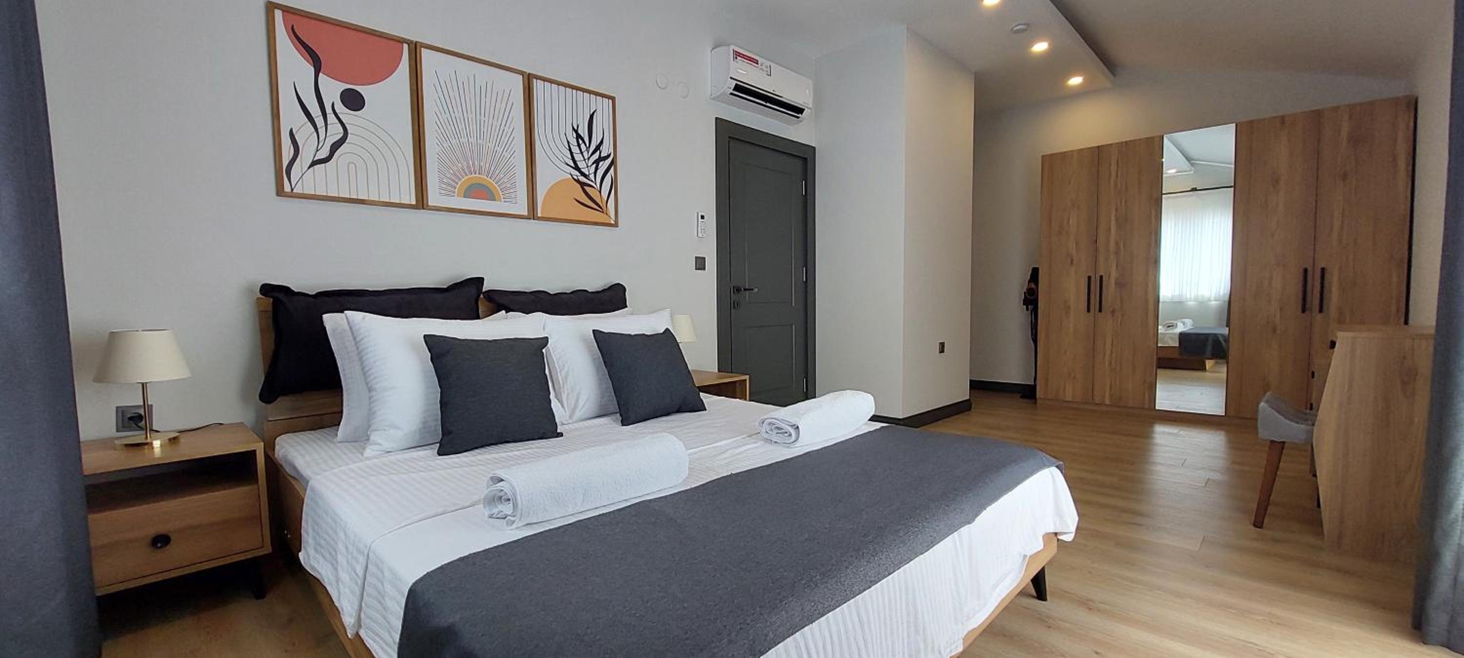 Three-Bedroom Apartment photo 1
