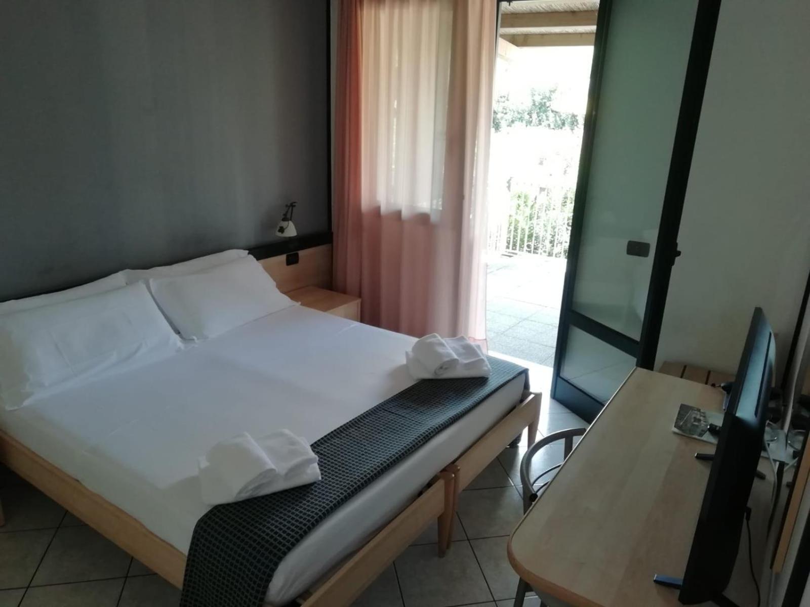 Double or Twin Room with Balcony and Garden View