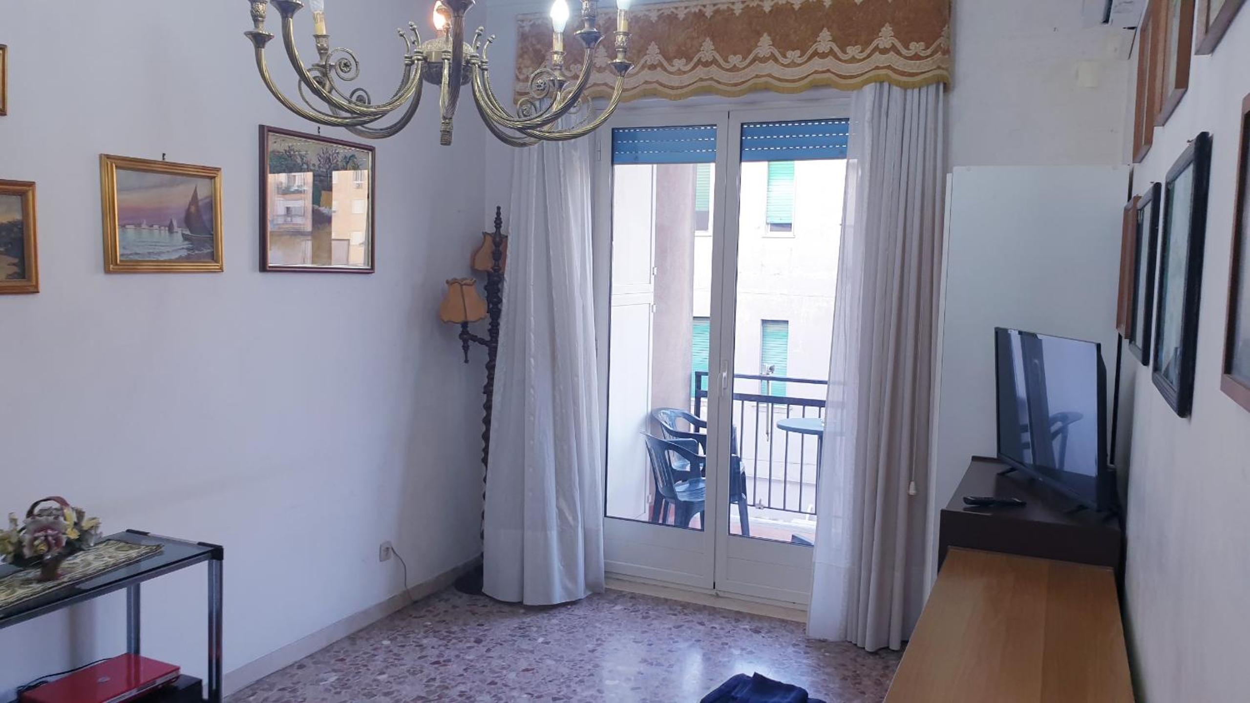 Three-Bedroom Apartment with Balcony