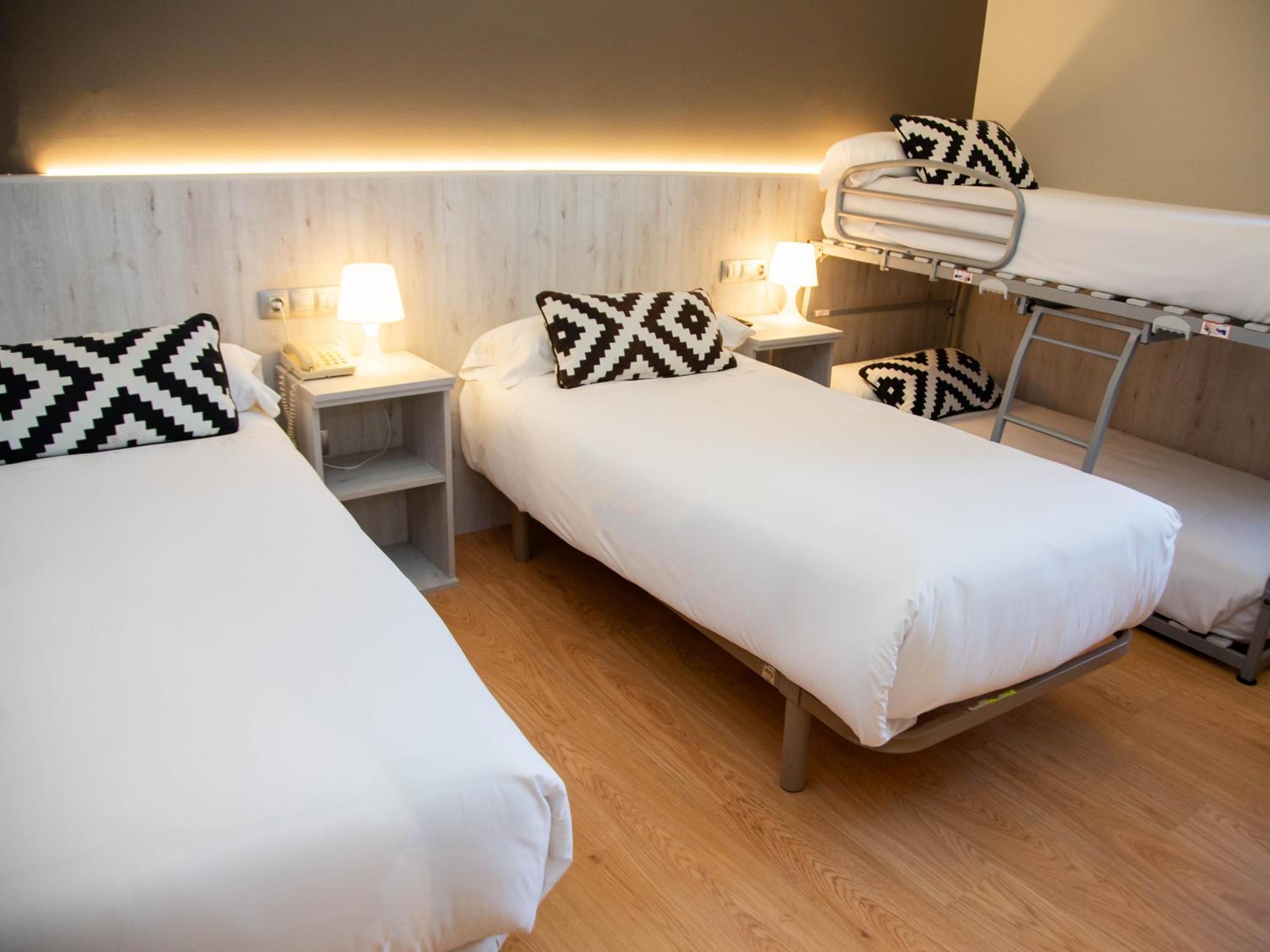 Habitación Cuádruple (2 Adultos + 2 Niños)