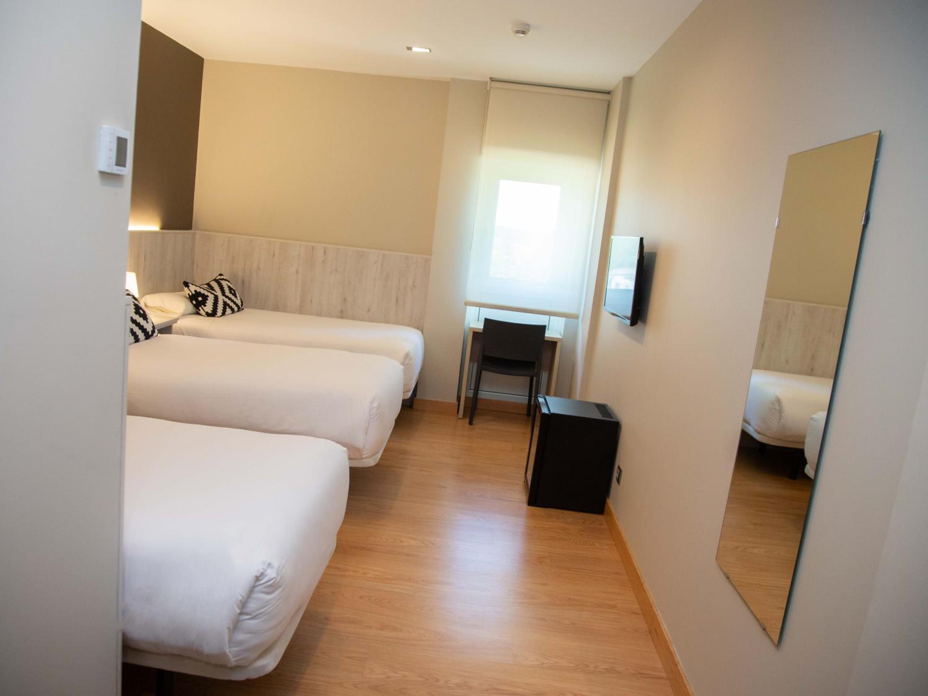 Habitación triple (2 adultos + 1 niño)