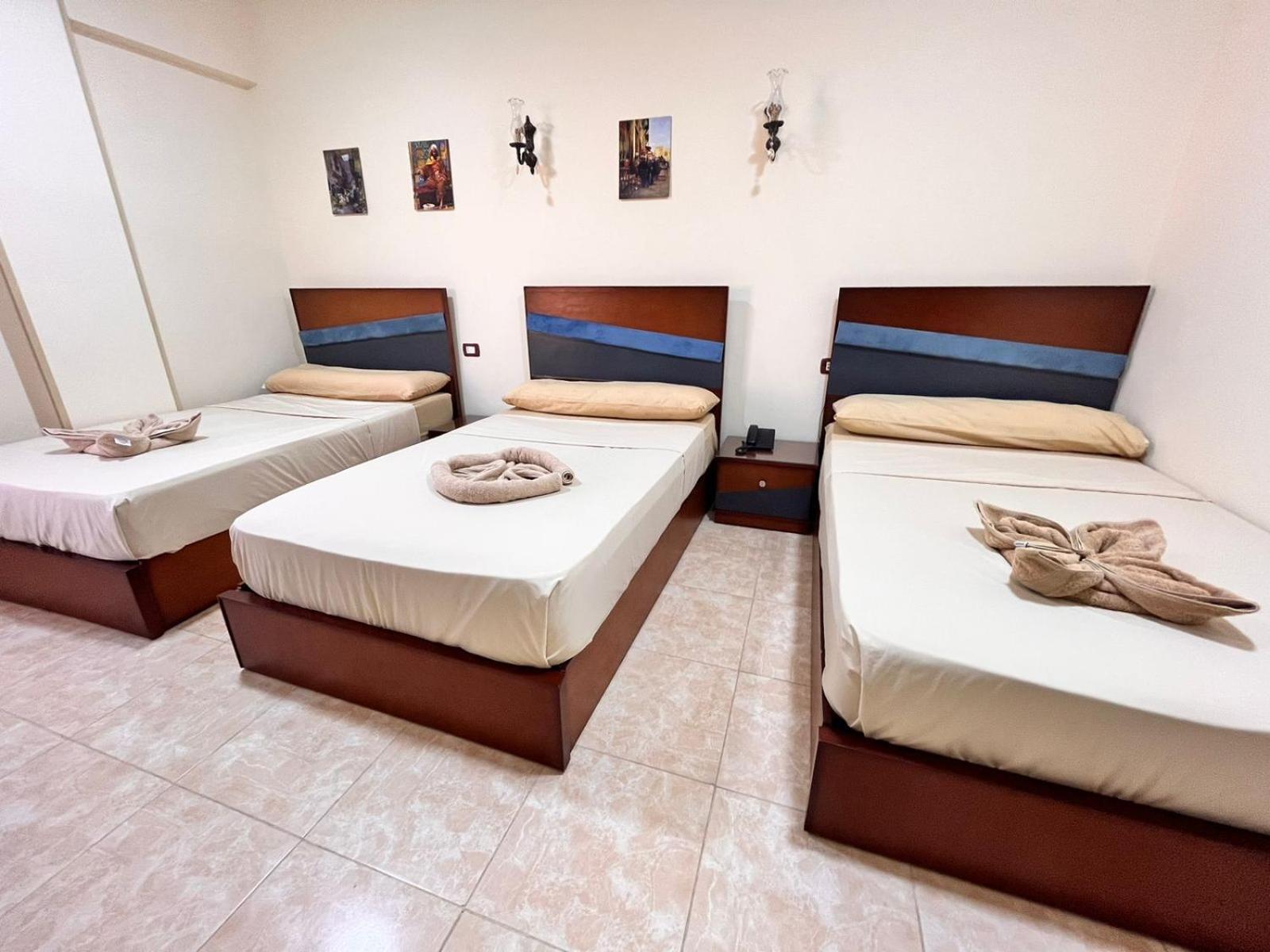 Triple Room - Photo 1
