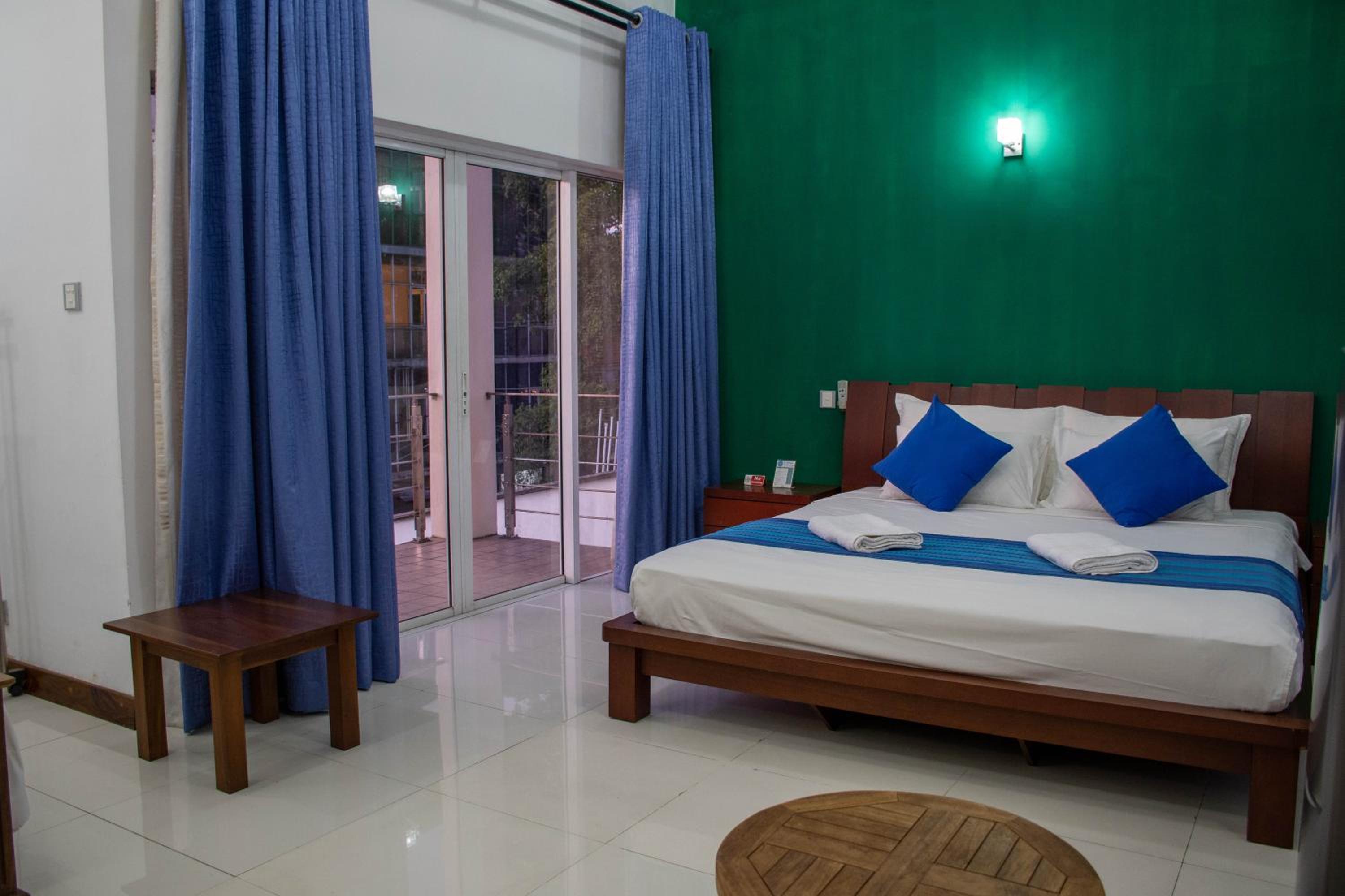 Family Room with Balcony - Photo 7
