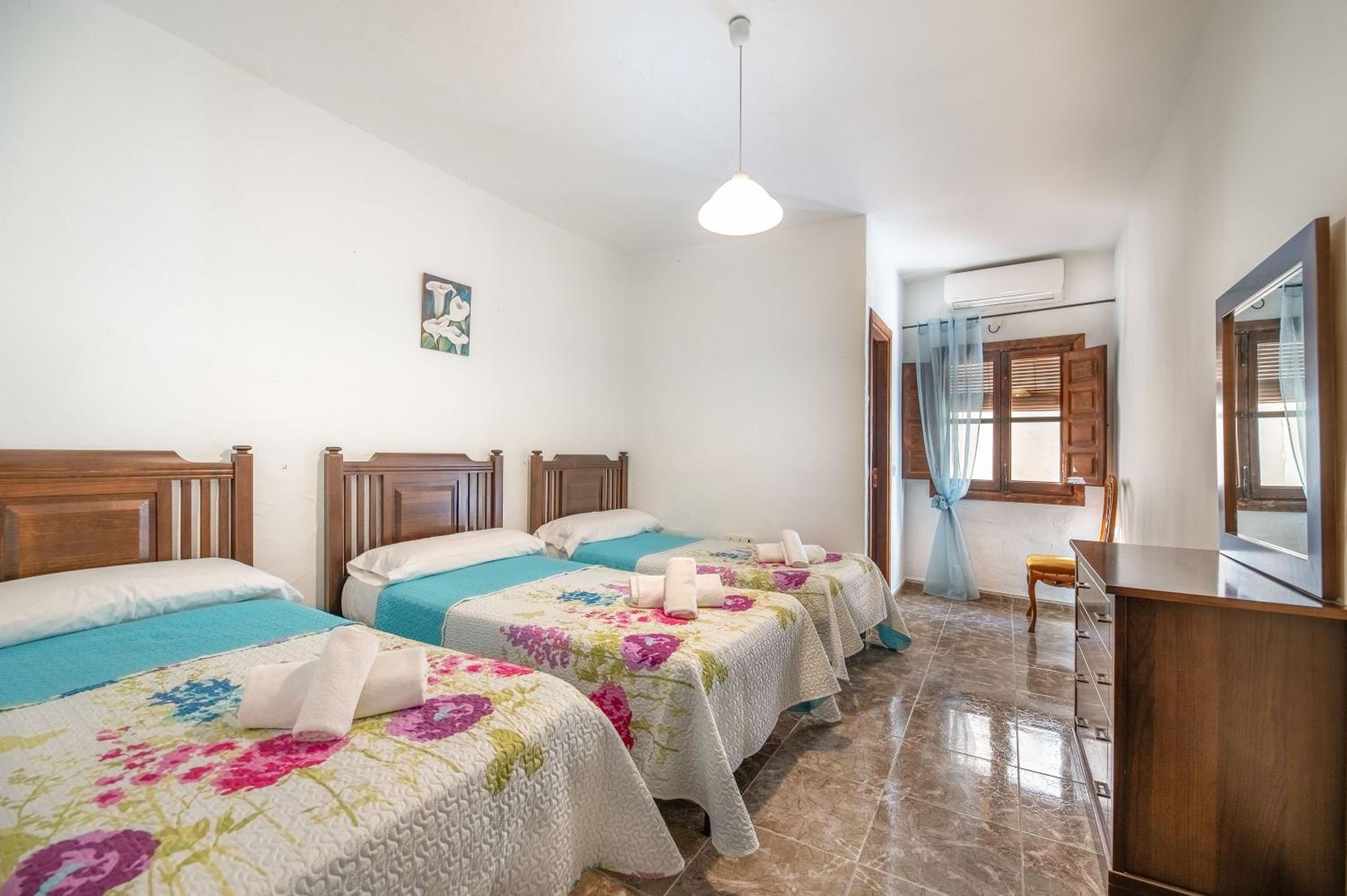 Habitación triple con ducha