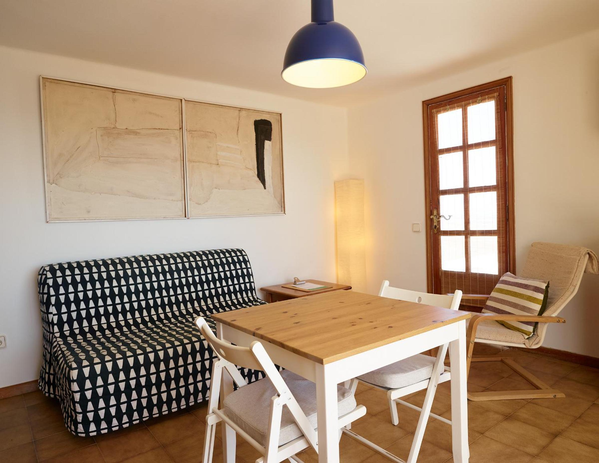 Habitación triple con vista al mar.