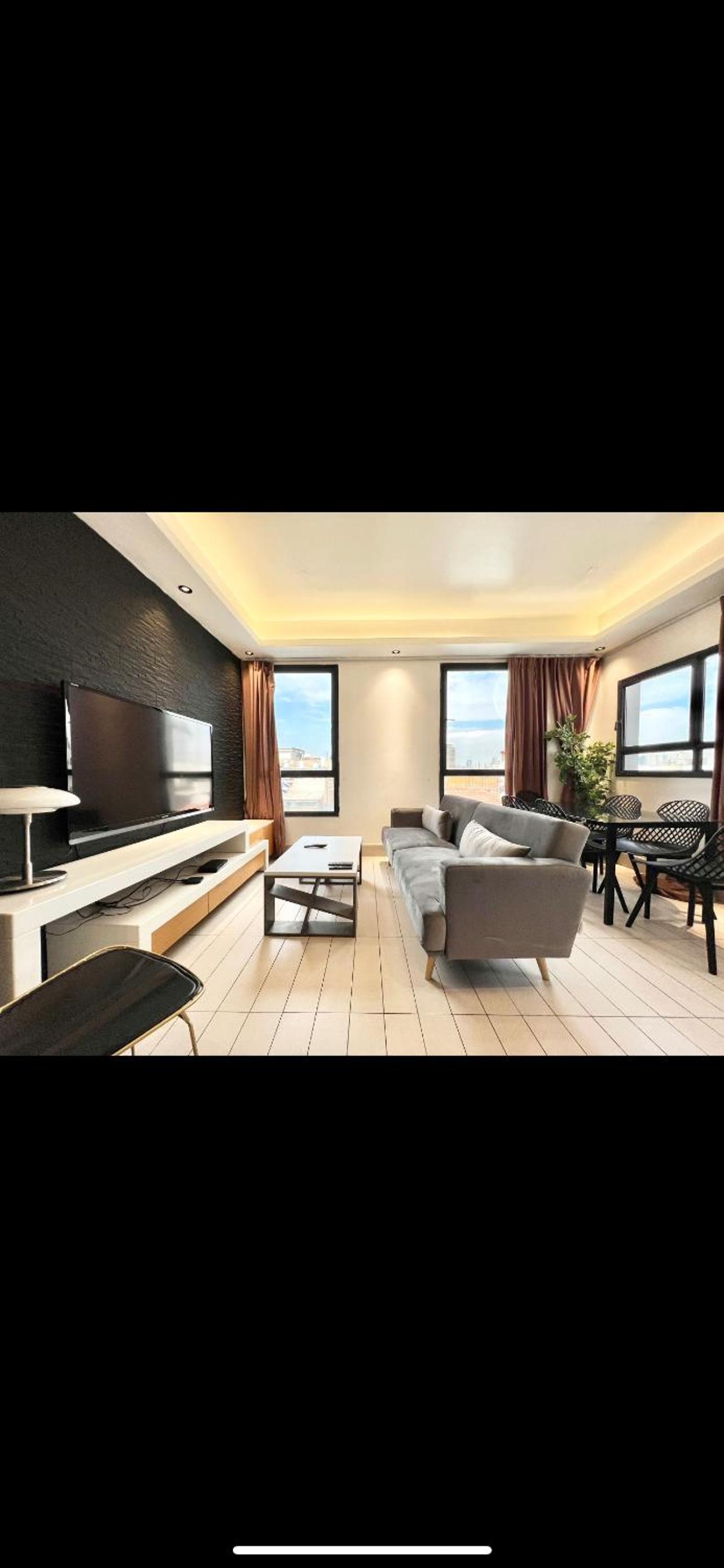 Three-Bedroom Apartment with Balcony