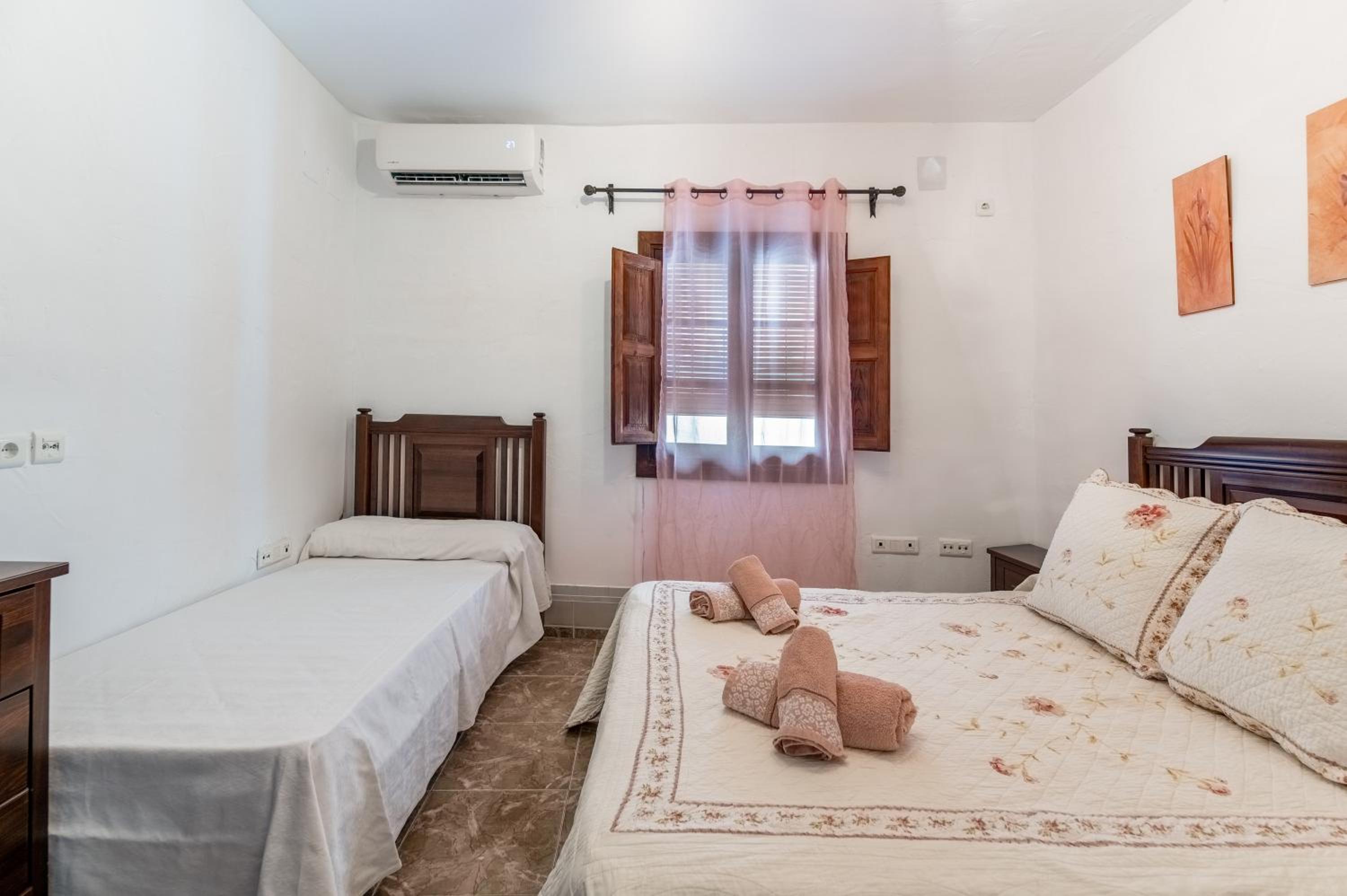 Habitación triple con baño