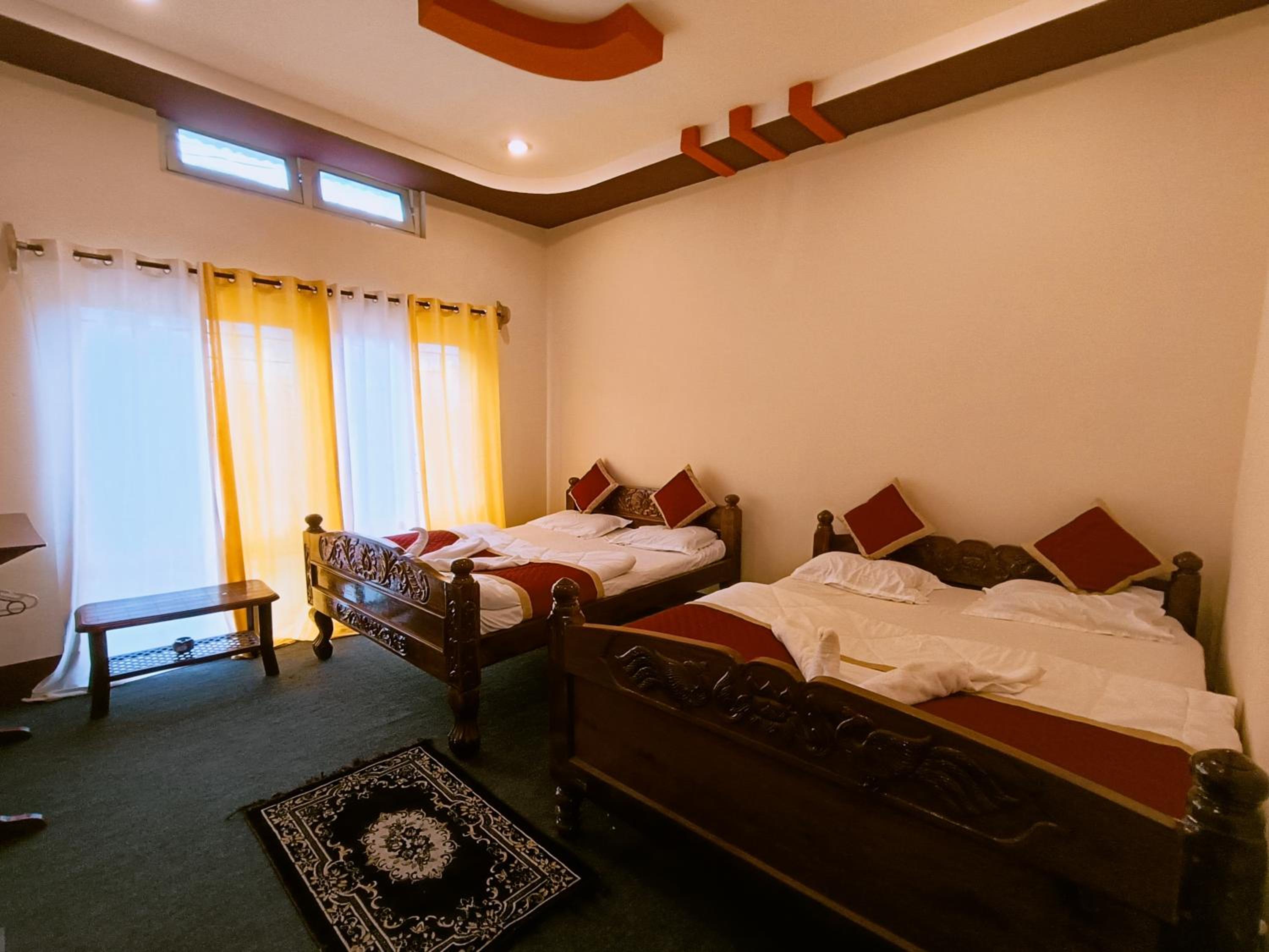 Deluxe Queen Room With Two Queen Beds photo 1
