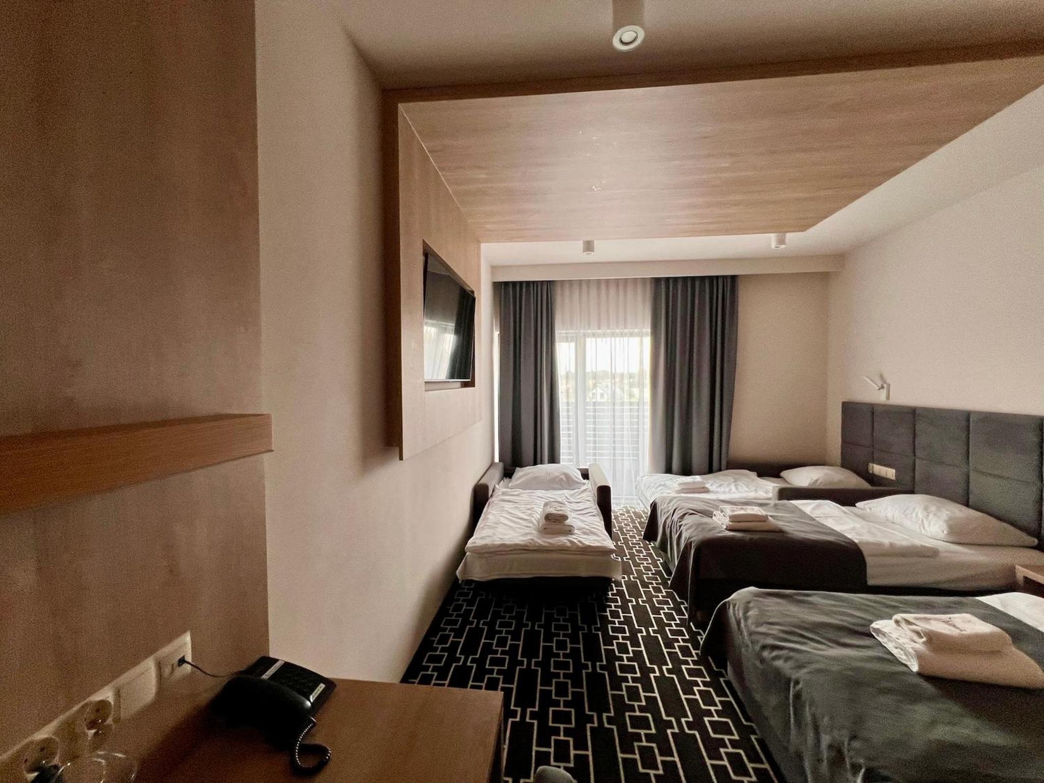 Quadruple Room - Photo 1