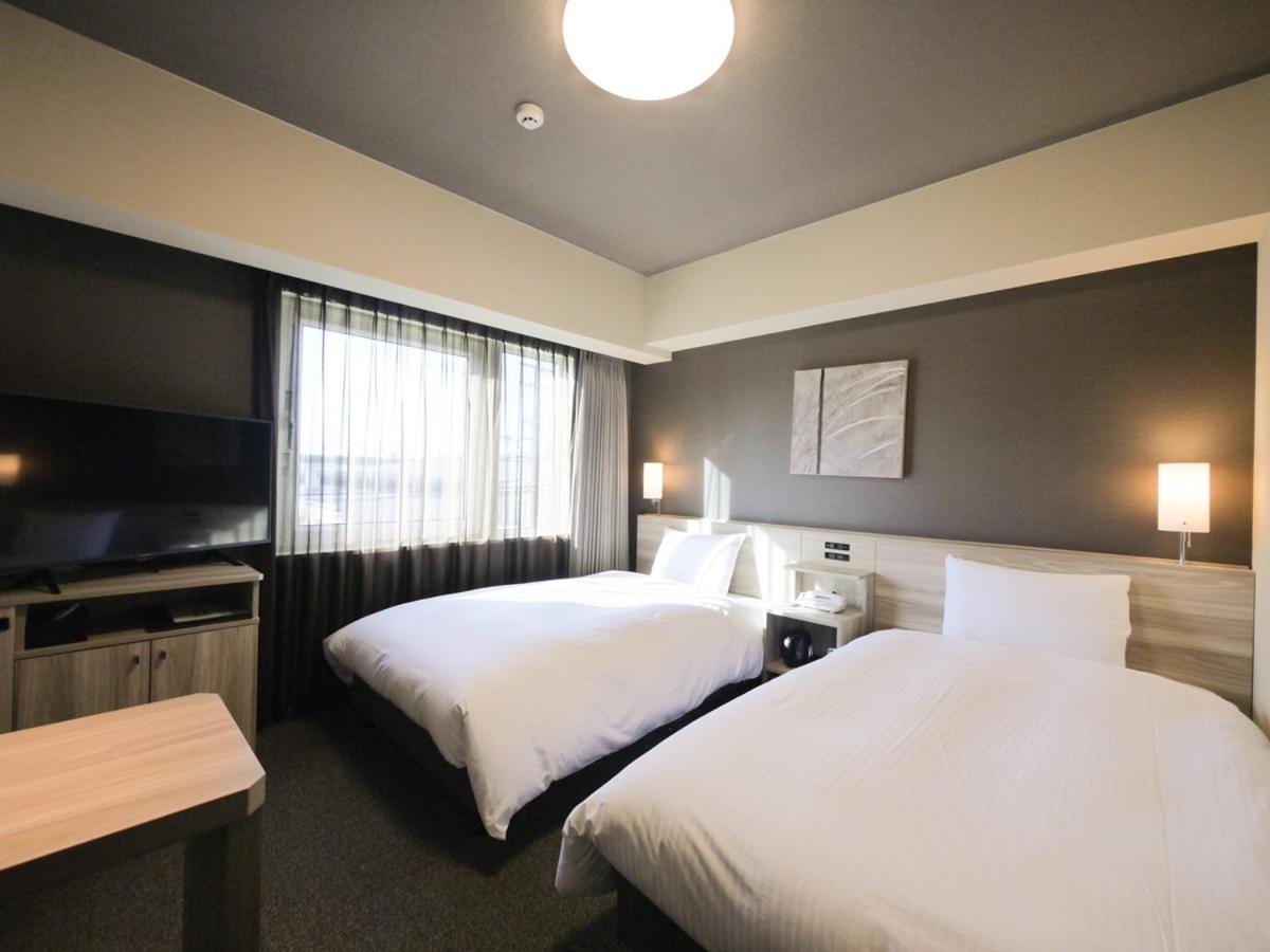 Twin Room - Non-Smoking - Photo 1