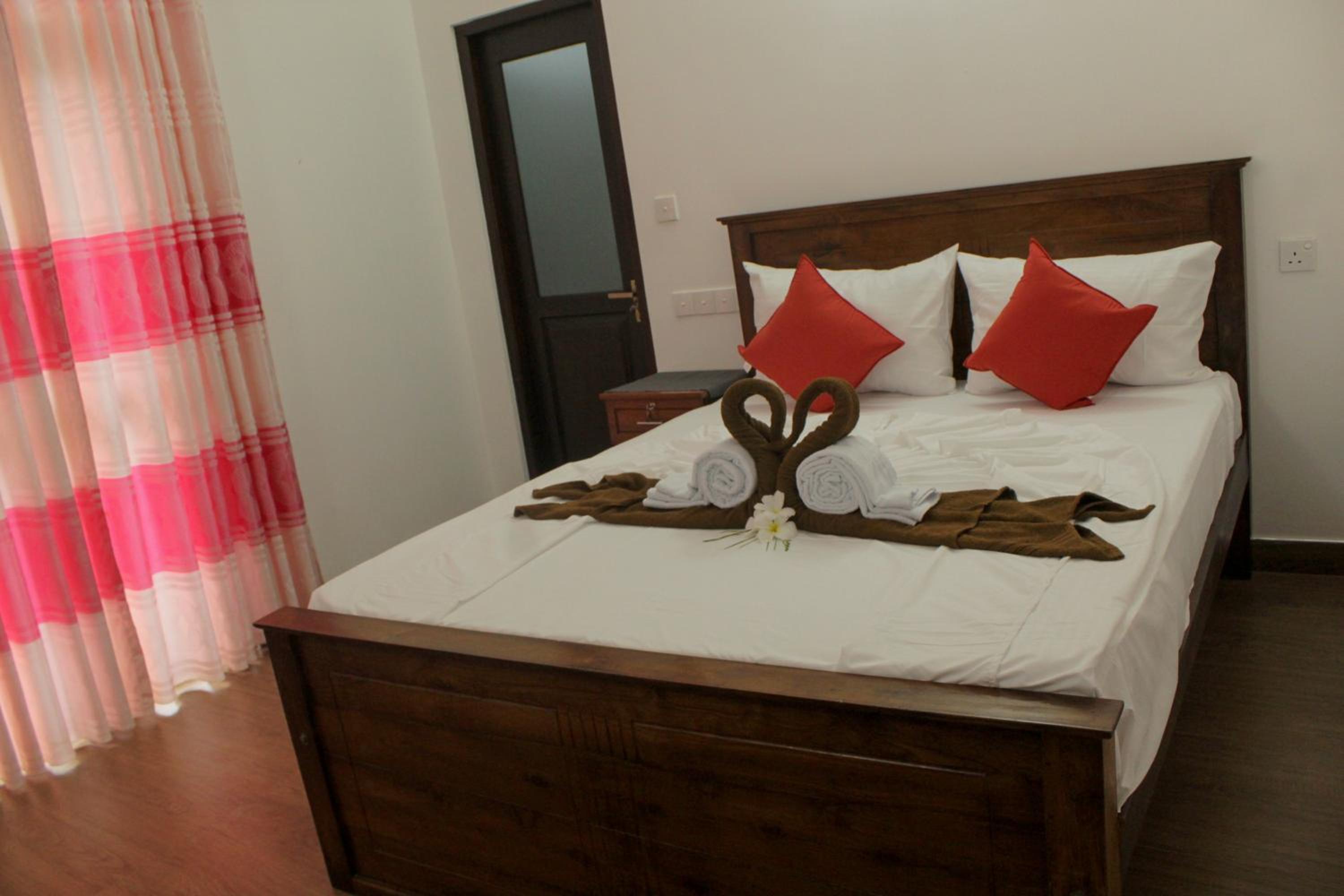 Deluxe Double Room (2 Adults + 1 Child) photo 2