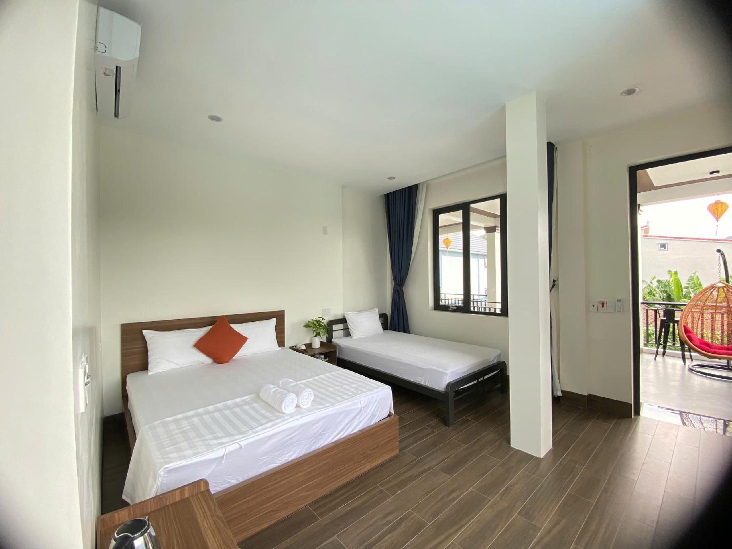 Deluxe Triple Room - Photo 8