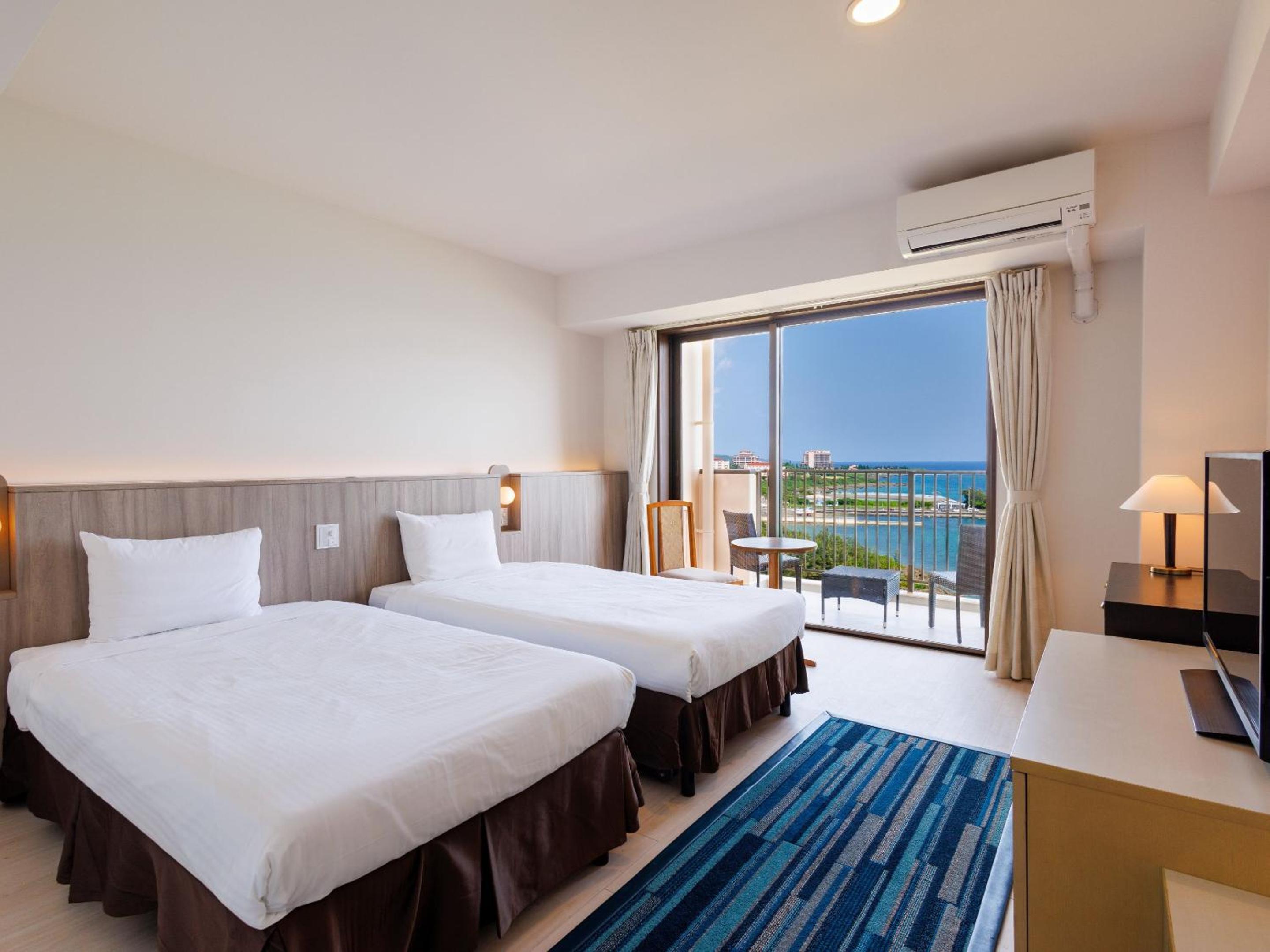 Standard Twin Room on Upper Floor(7-11F) with Terrace 31㎡ - Sea view- Tower Building photo 1