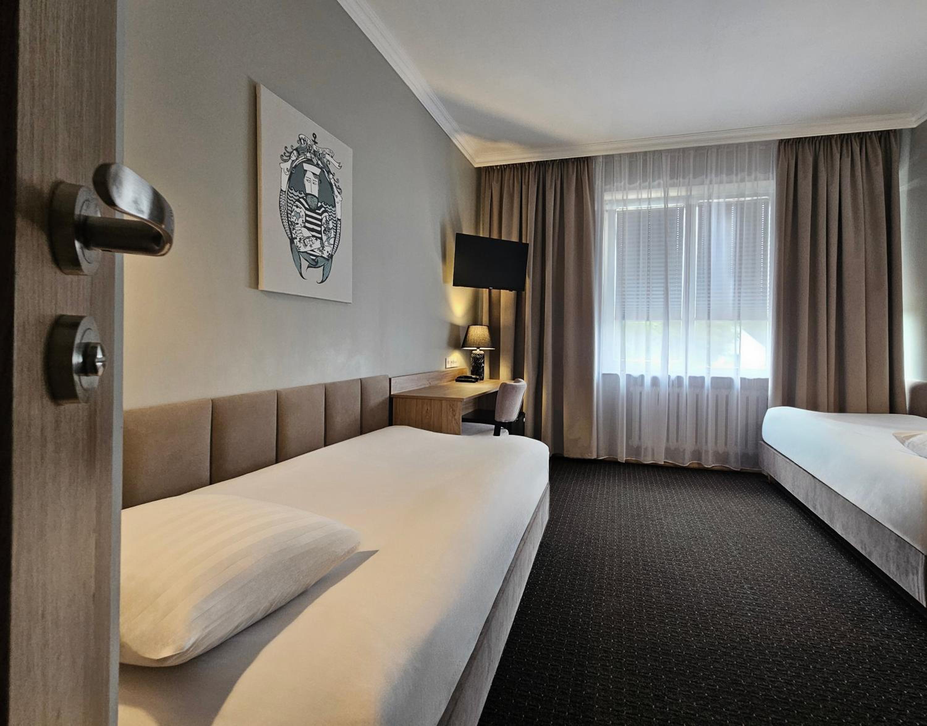 Twin Room - Photo 1