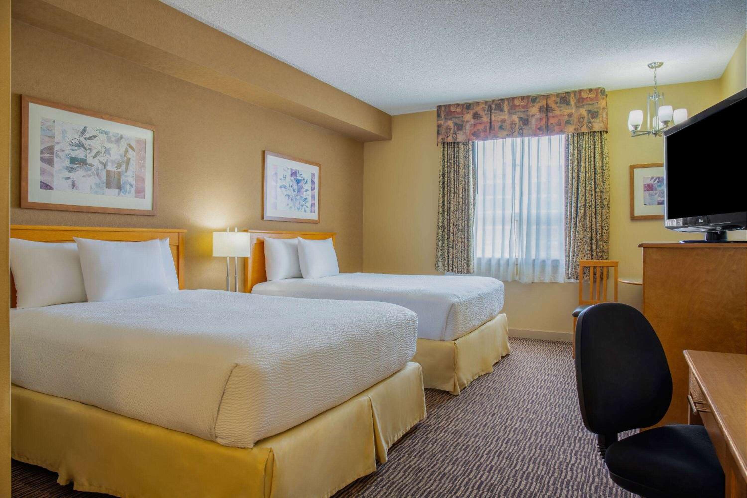 Queen Room with Two Queen Beds - Non-Smoking - Photo 1