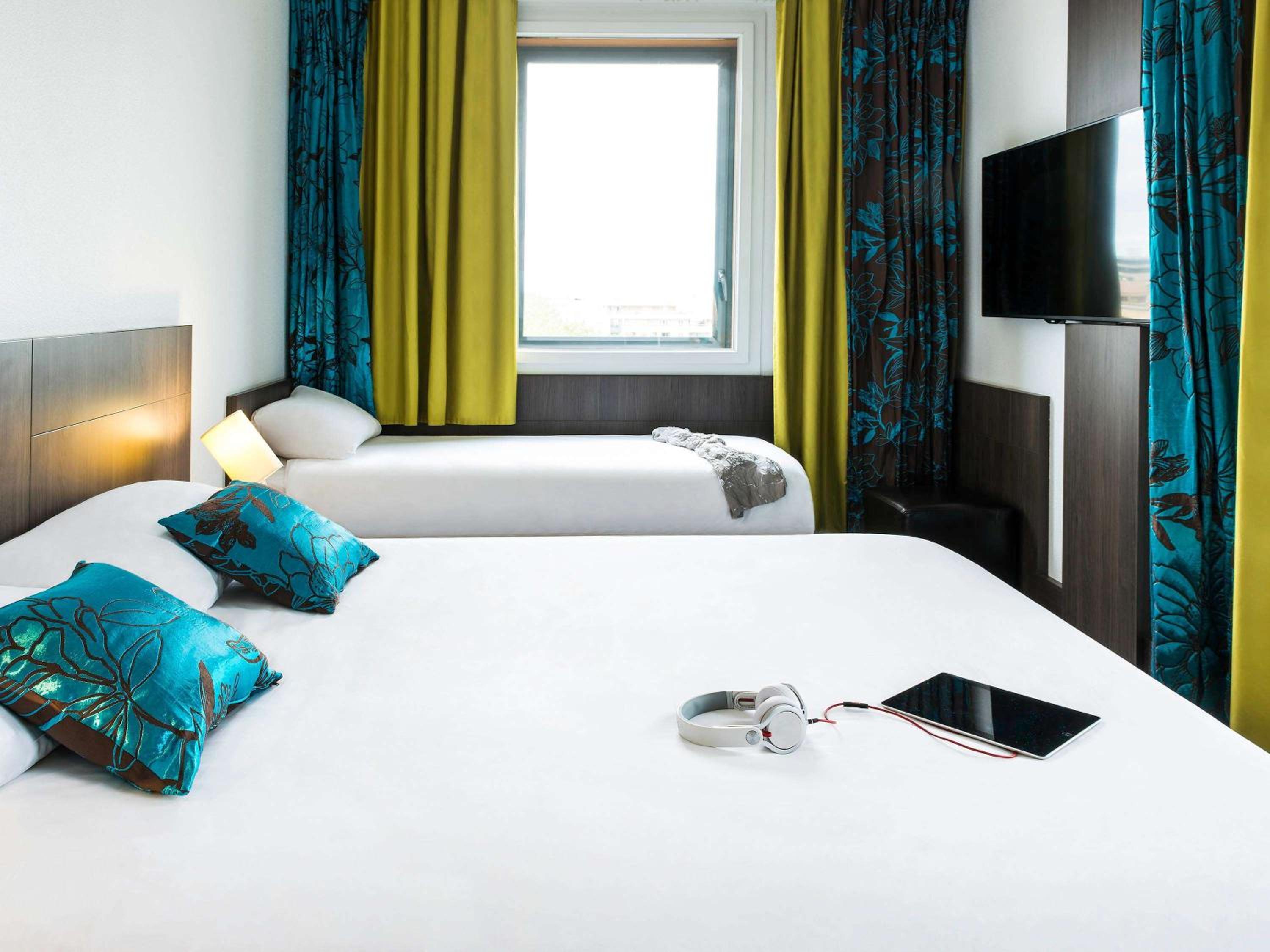 Superior Room One Queen Bed and One Sofa Bed