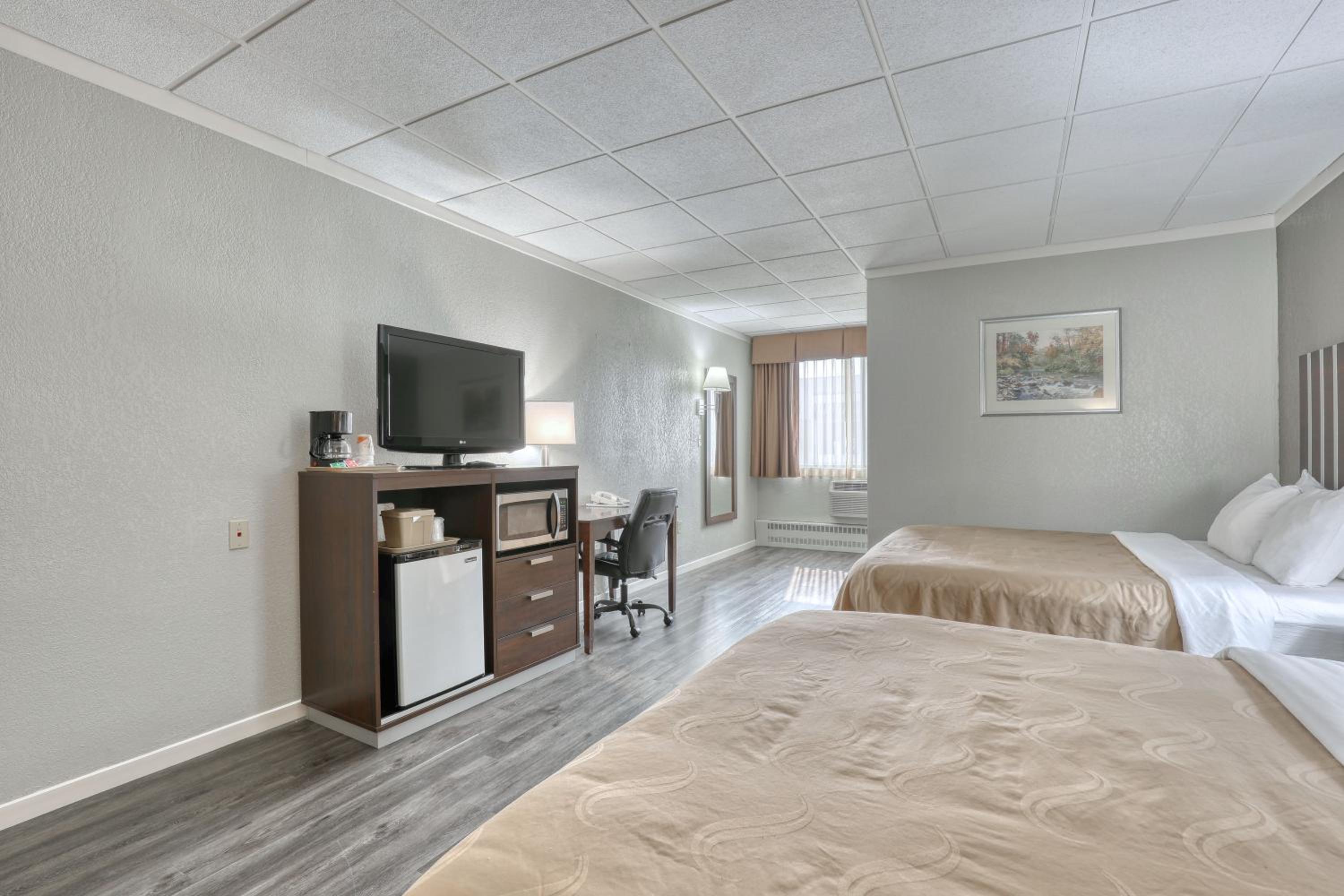 Queen Room with Two Queen Beds - Pet Friendly/Non-Smoking - Photo 1
