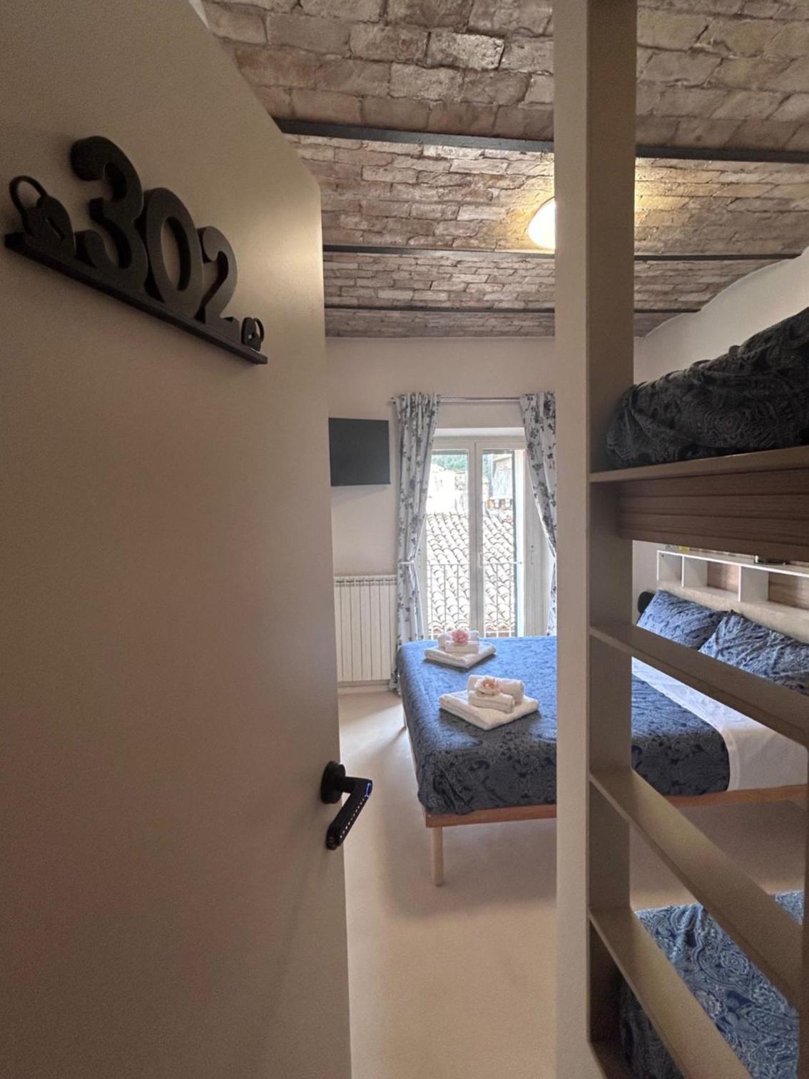 Quadruple Room with Private Bathroom photo 1