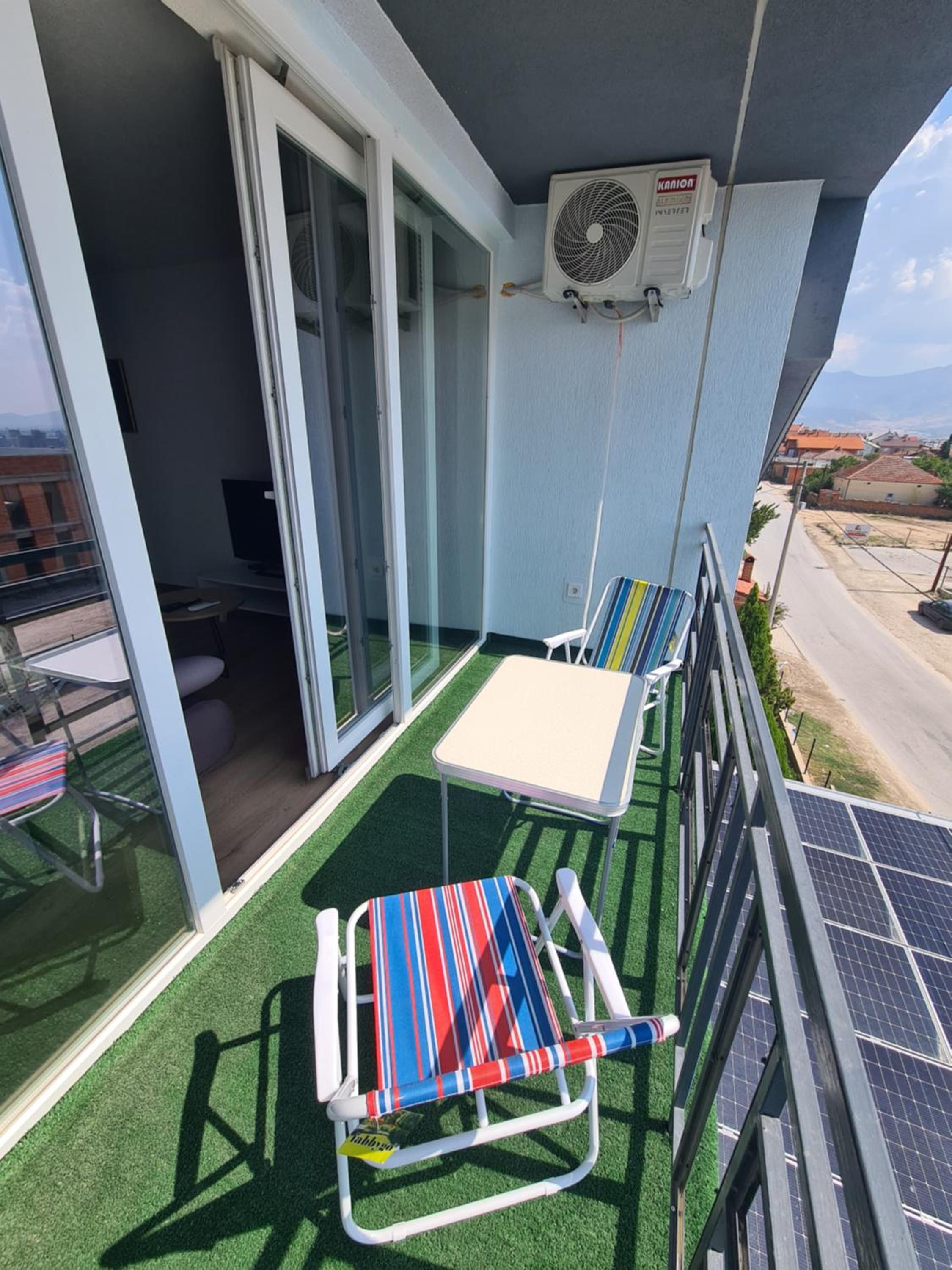 One-Bedroom Apartment with Balcony and City View photo 3