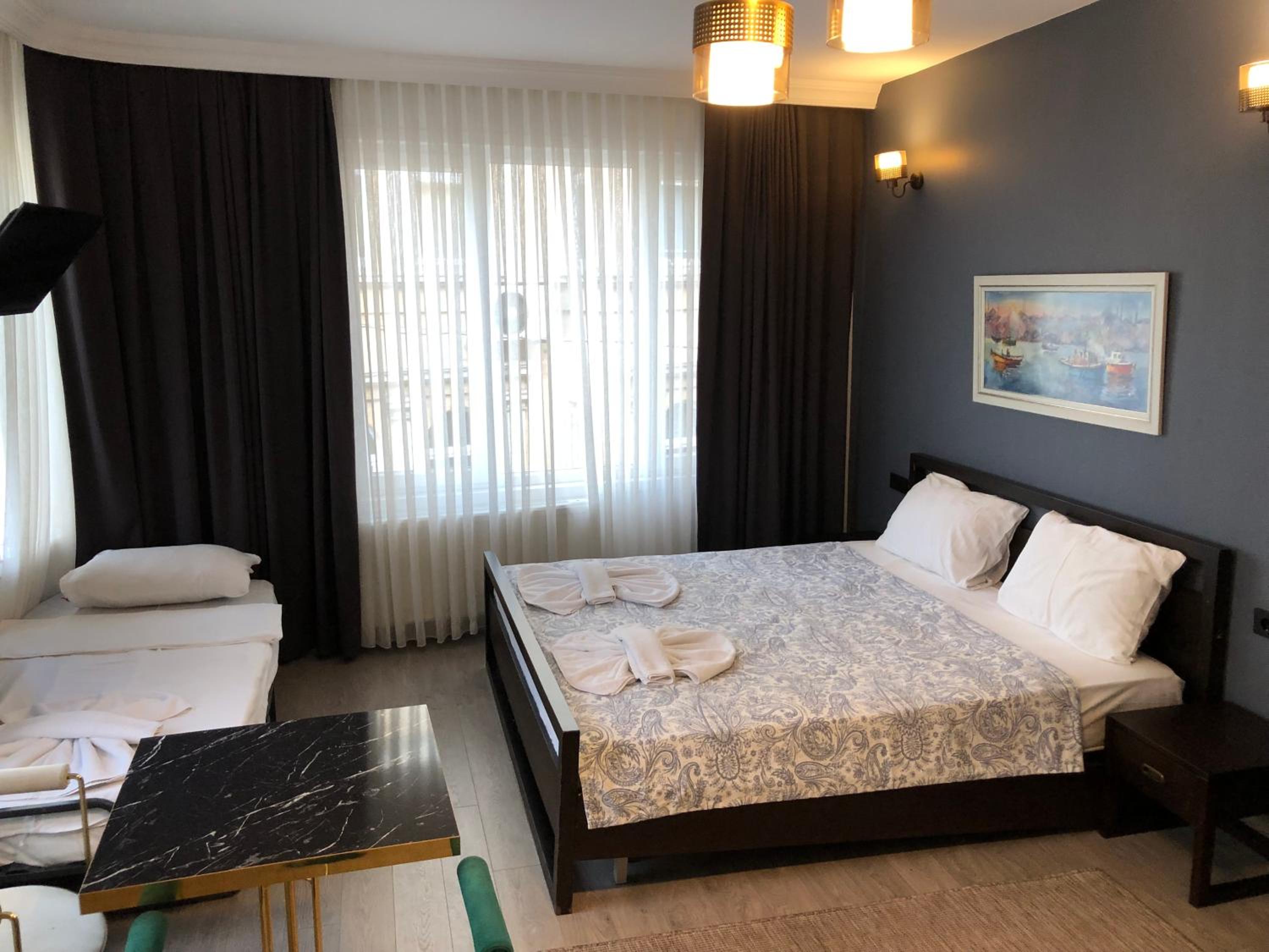 Deluxe Triple Room