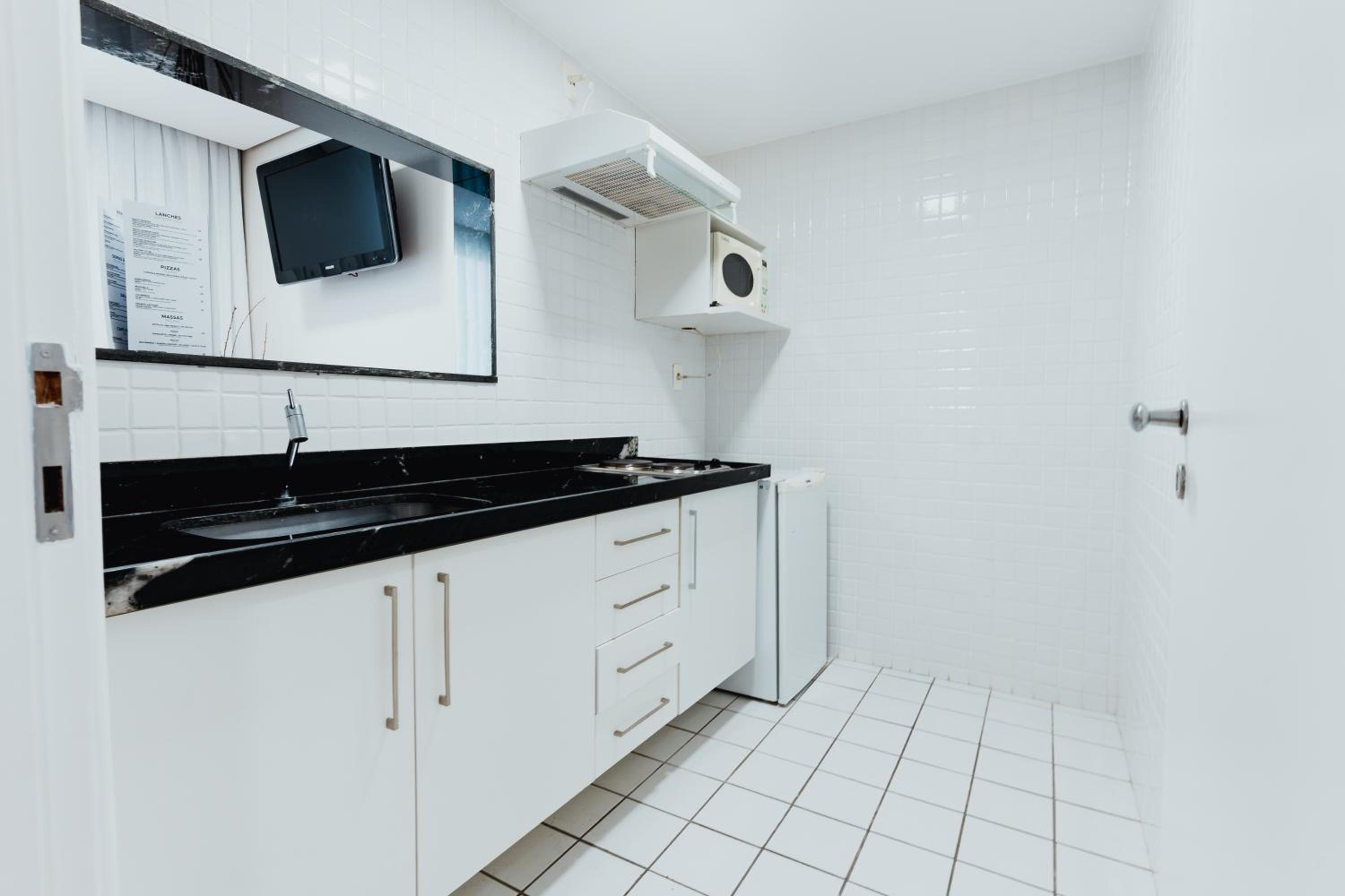 Apartamento com varanda e churrasqueira photo 3