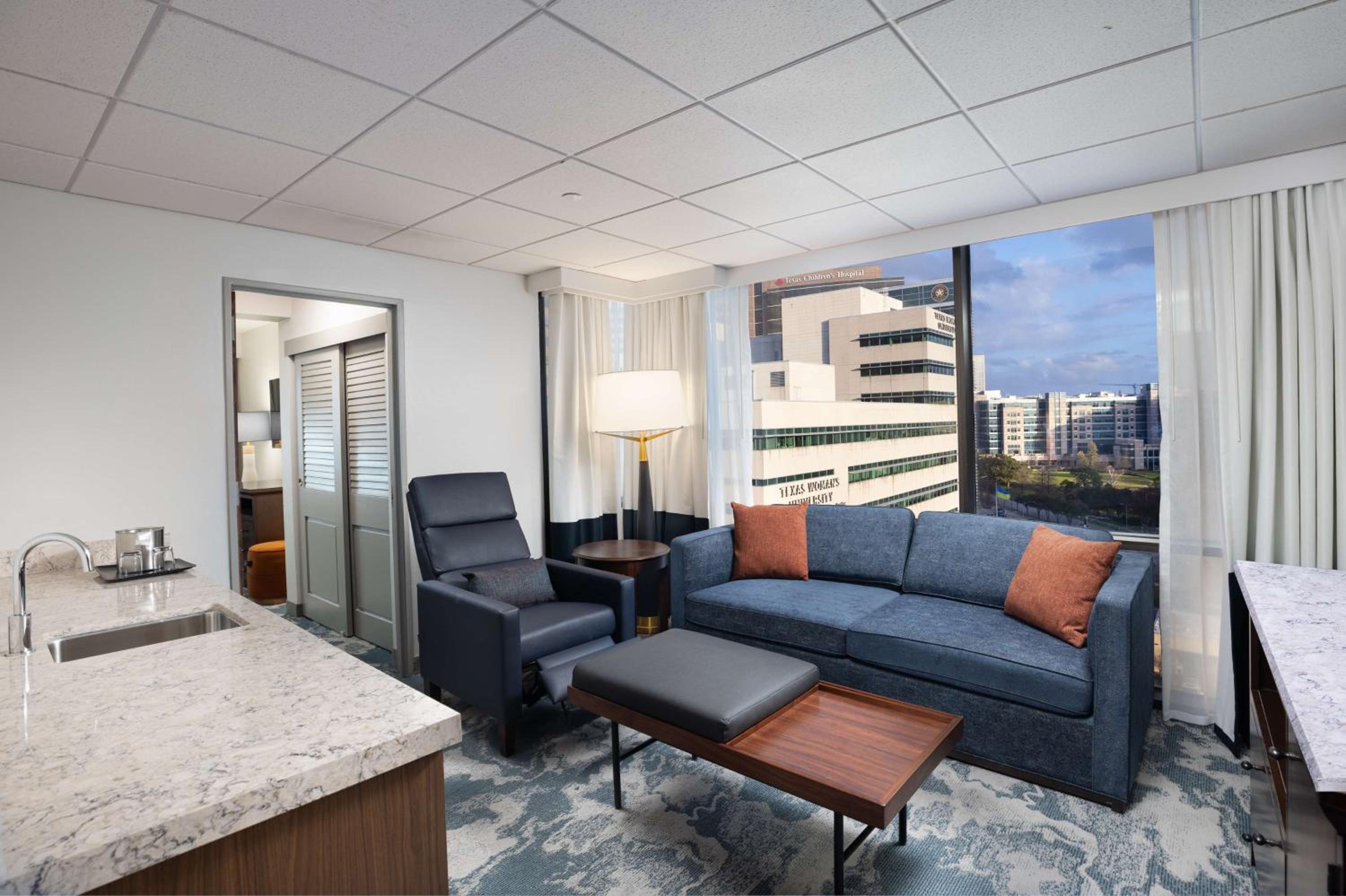 One-Bedroom King Suite with Sofa Bed and Kitchen - Photo 21