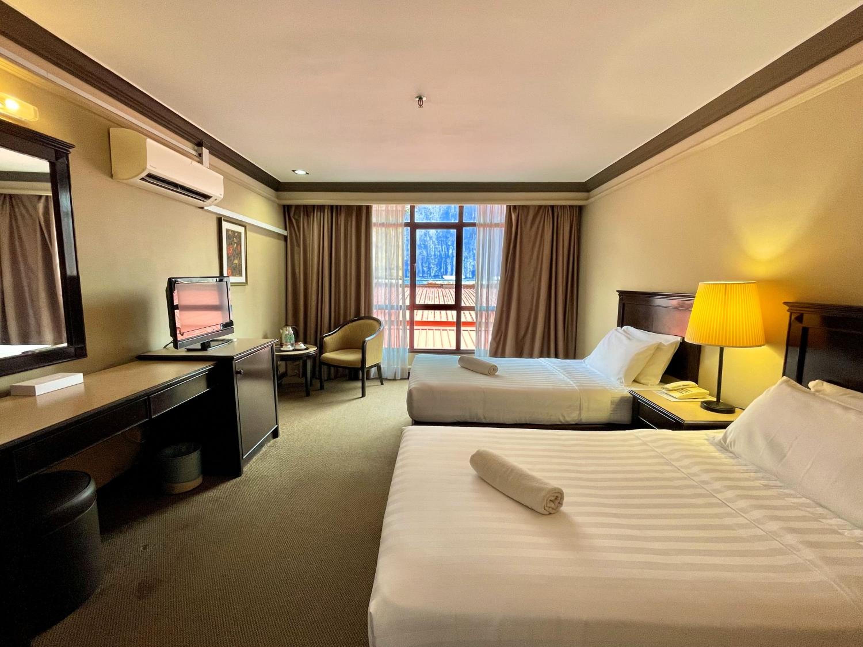 Standard Twin Room - Photo 4