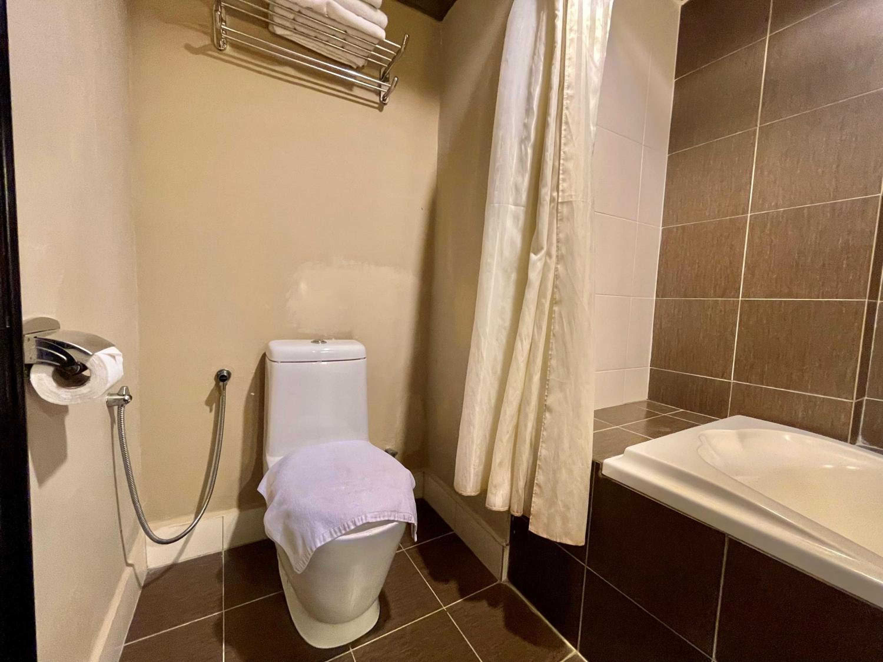 Deluxe Triple Room - Photo 8