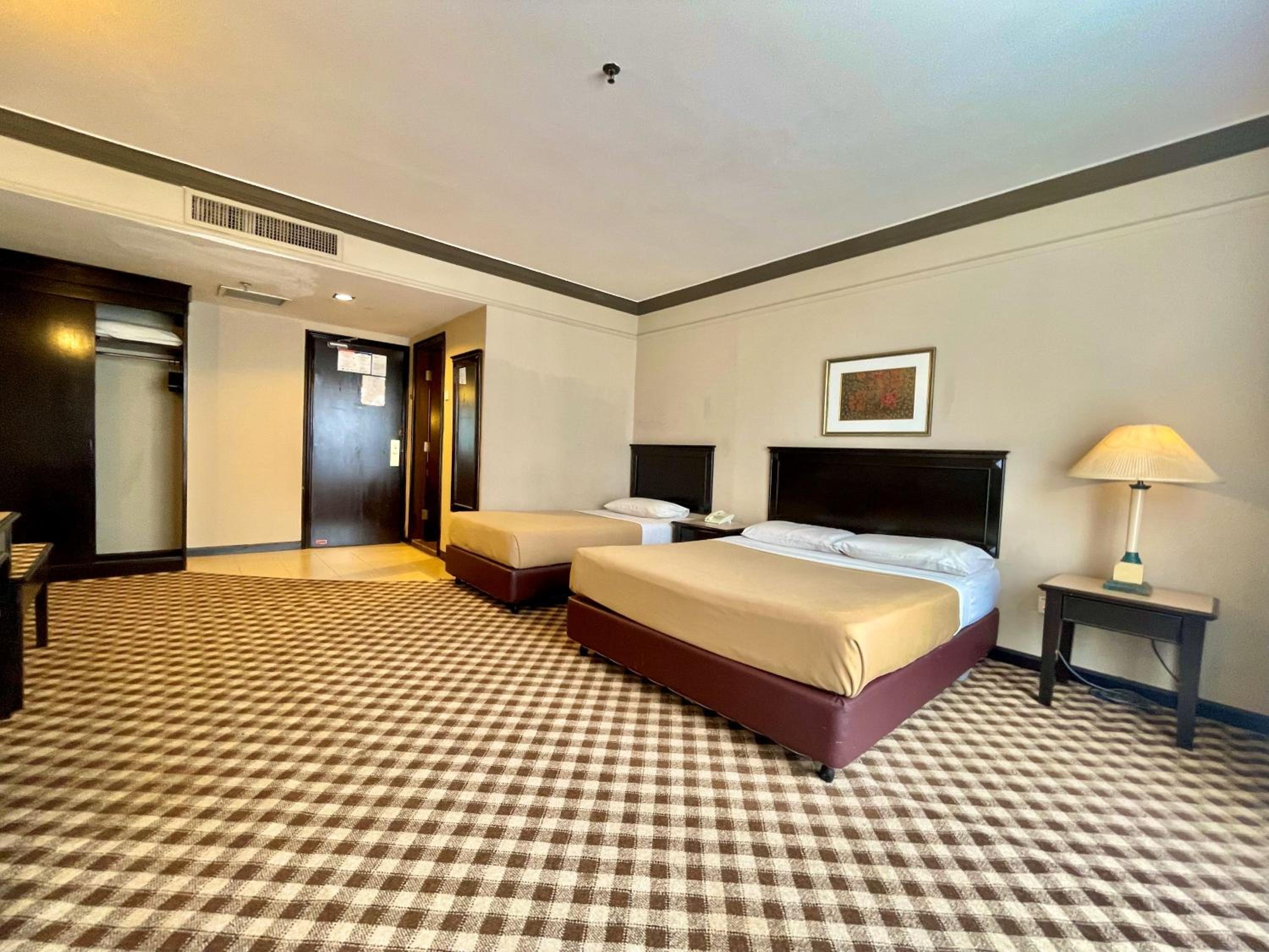 Deluxe Triple Room - Photo 7