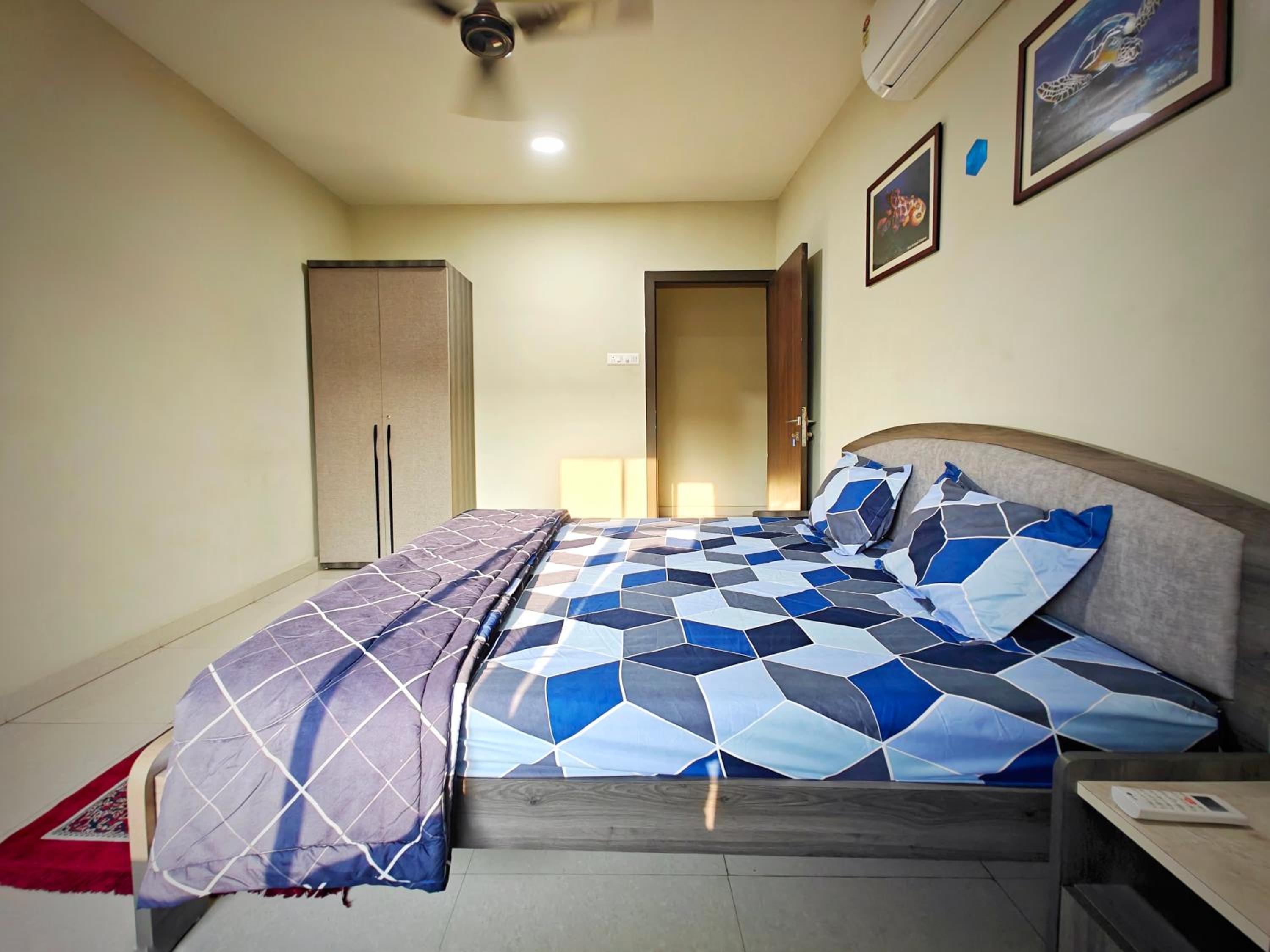 Three-Bedroom Apartment - High Floor photo 2