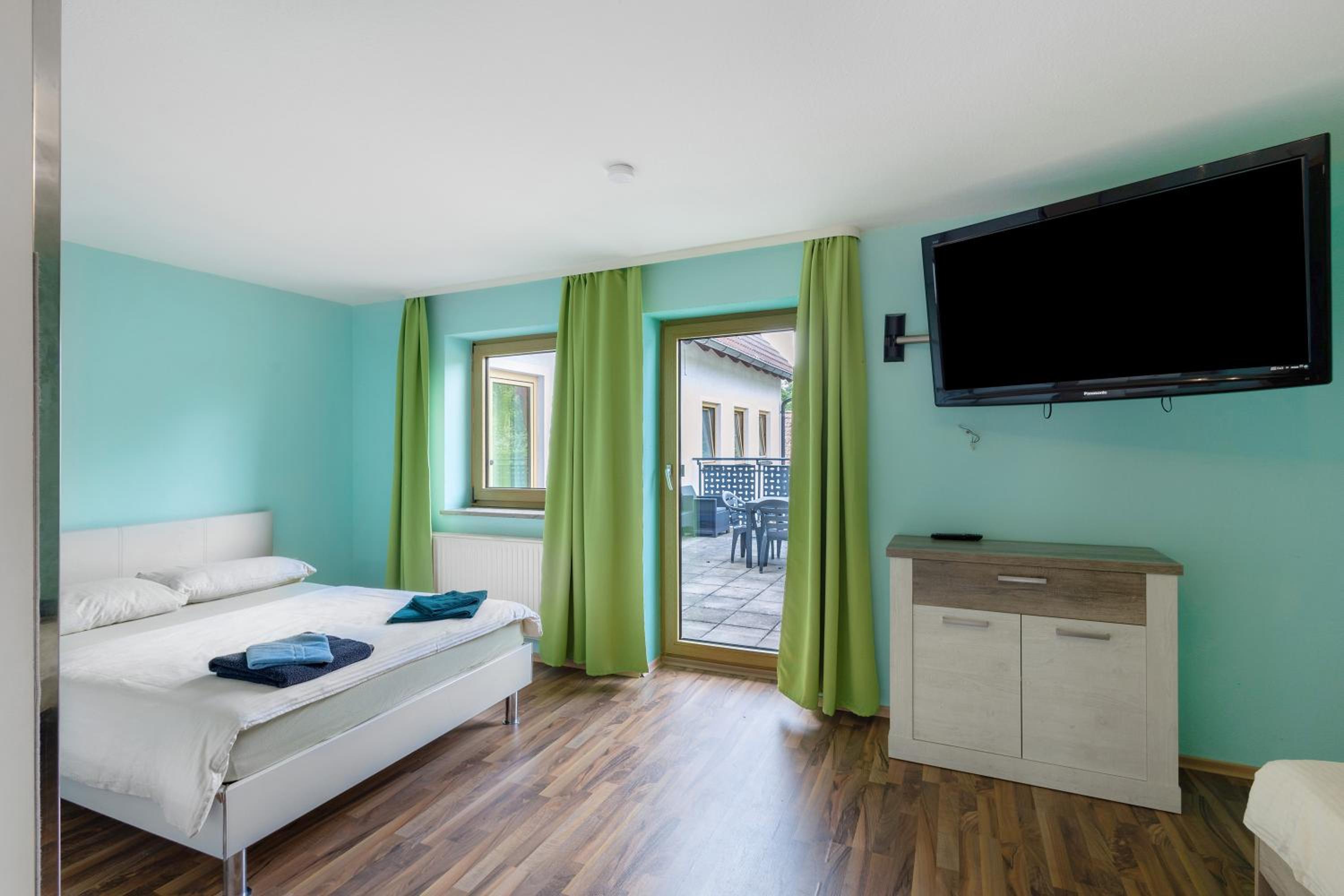 One-Bedroom Apartment with Garden View