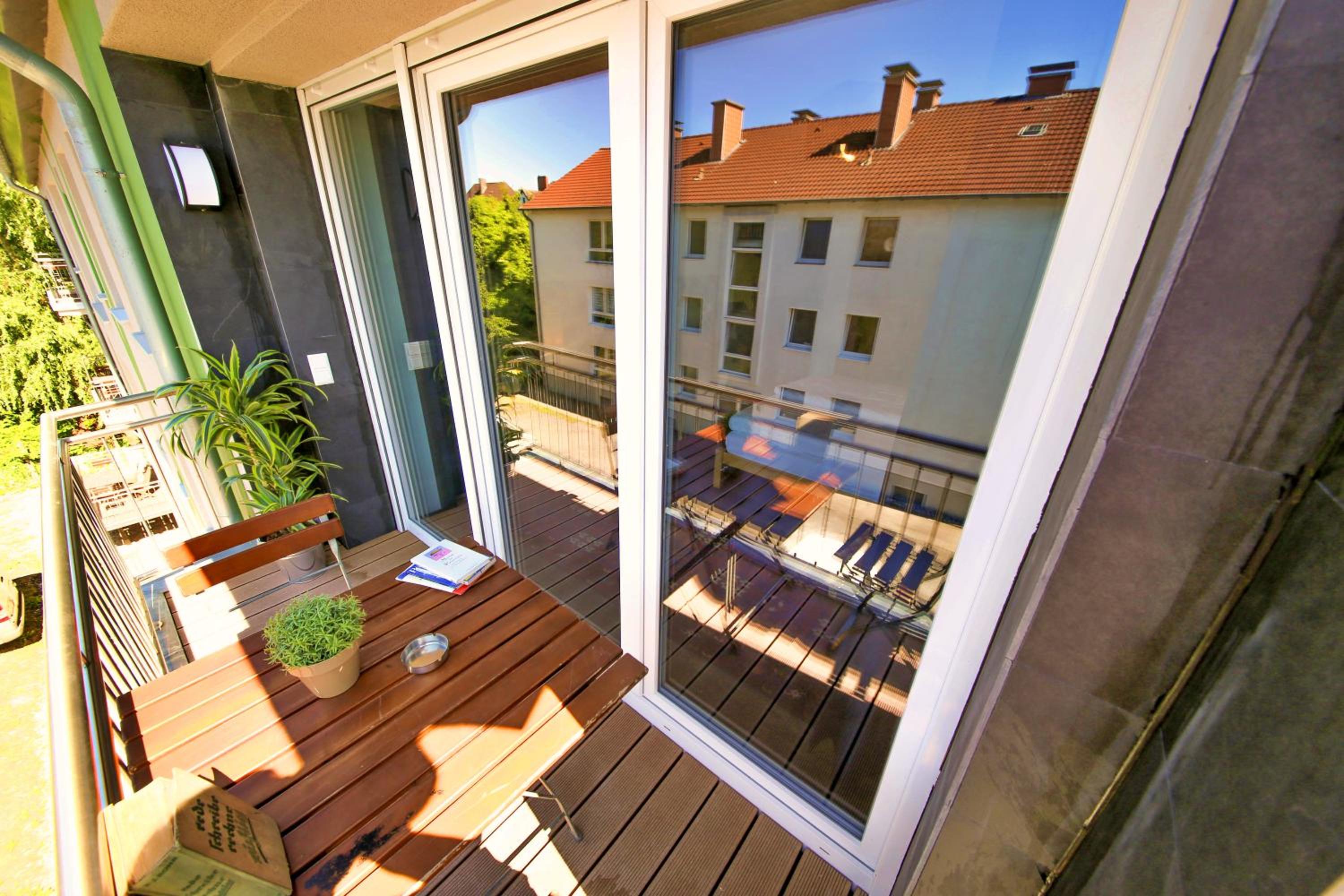 Three-Bedroom Apartment with Balcony photo 2