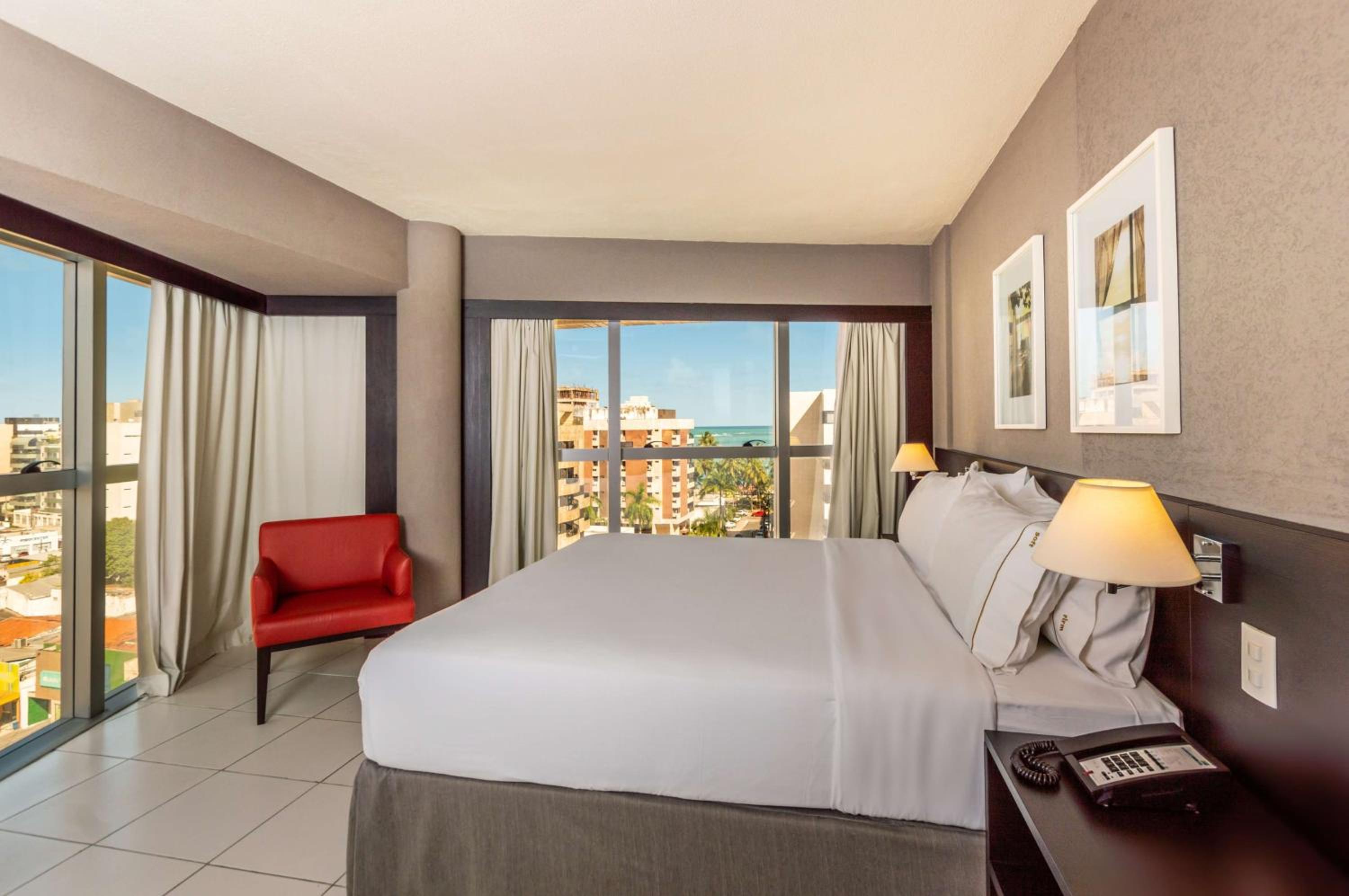 Corner King Room with Partial Ocean View - Photo 2