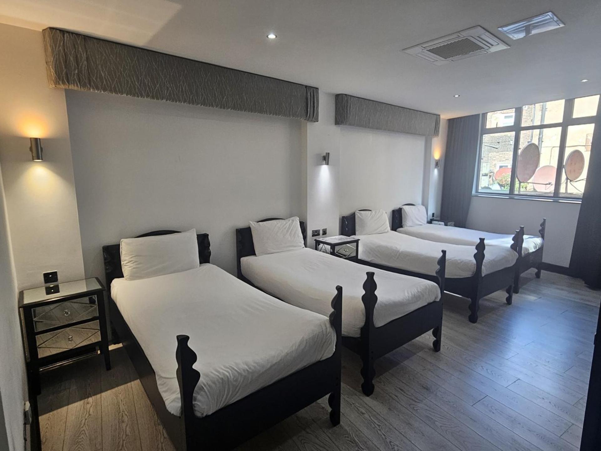 Quadruple Room - Photo 9