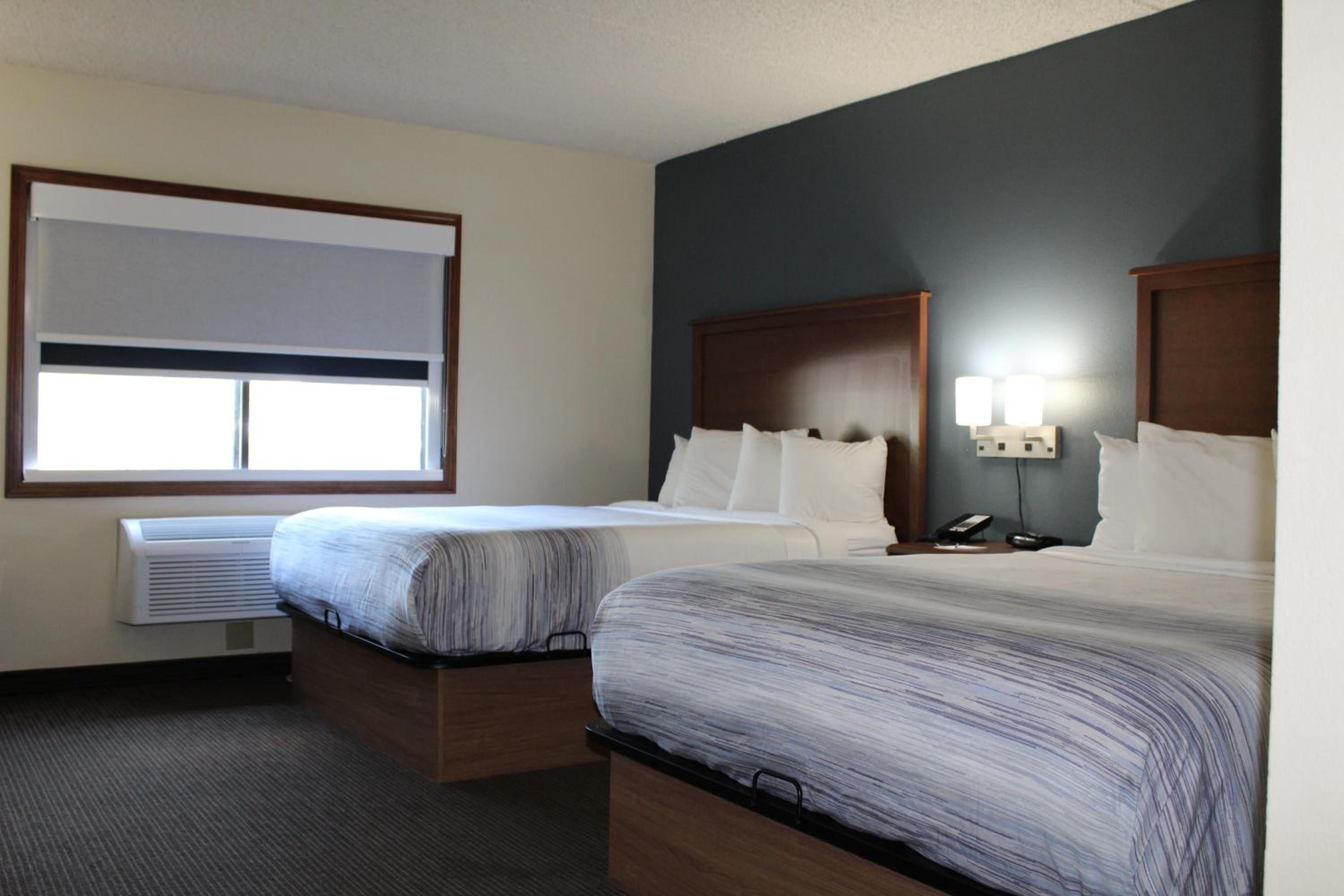 Executive Queen Room with Two Queen Beds - Non-Smoking - Photo 1