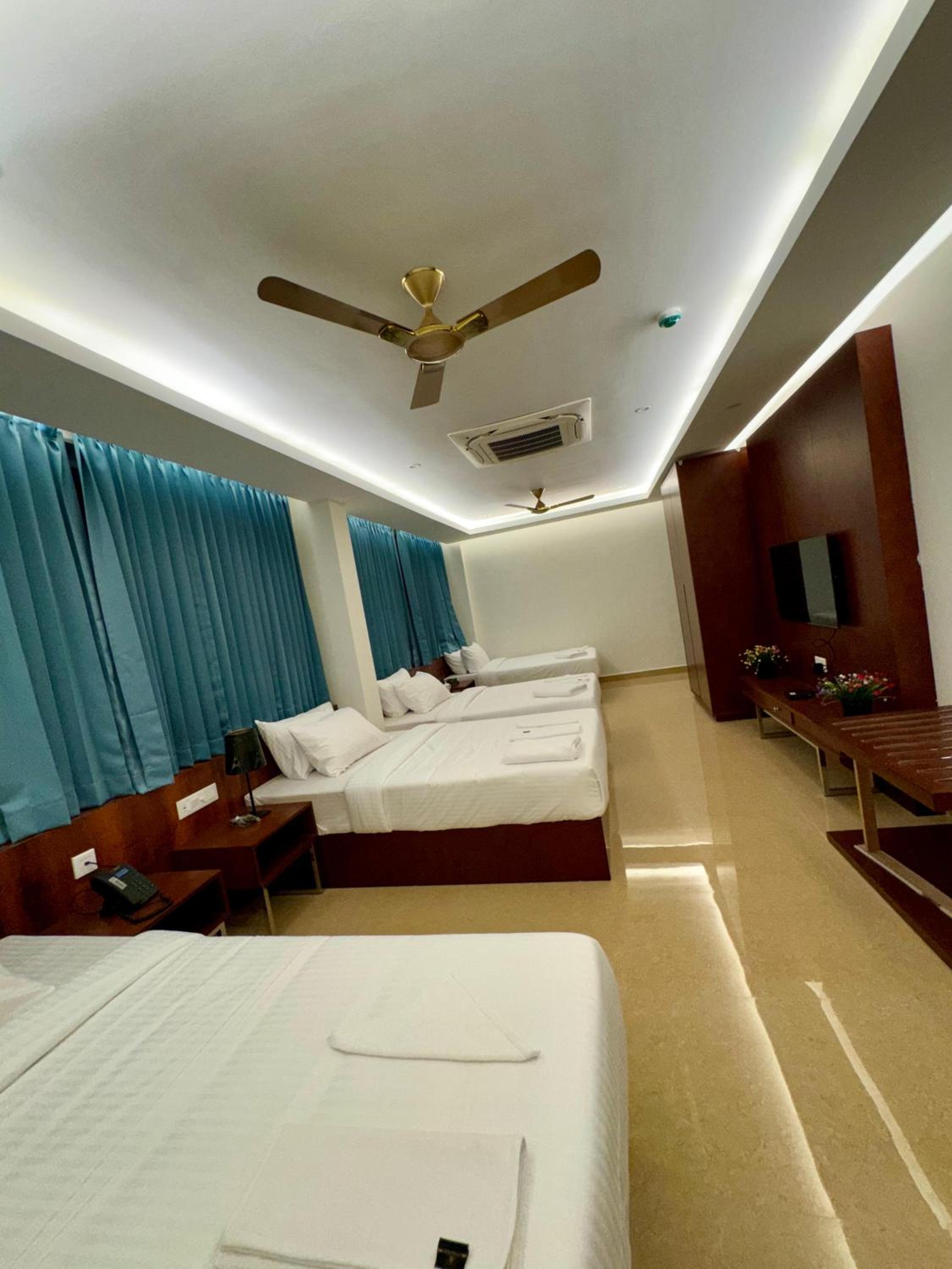 Deluxe Quadruple Room - Photo 4