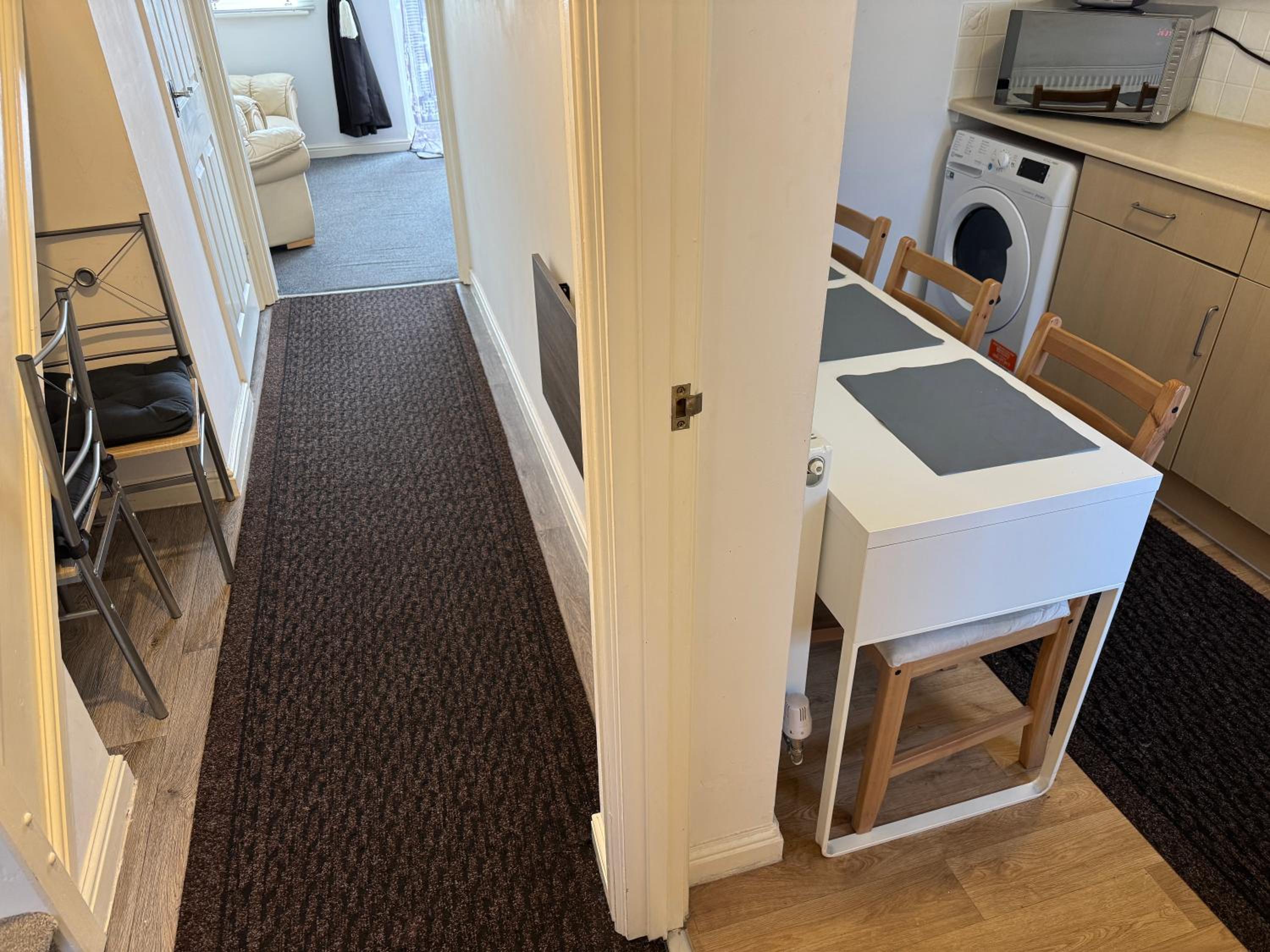 Three-Bedroom Apartment - Photo 50