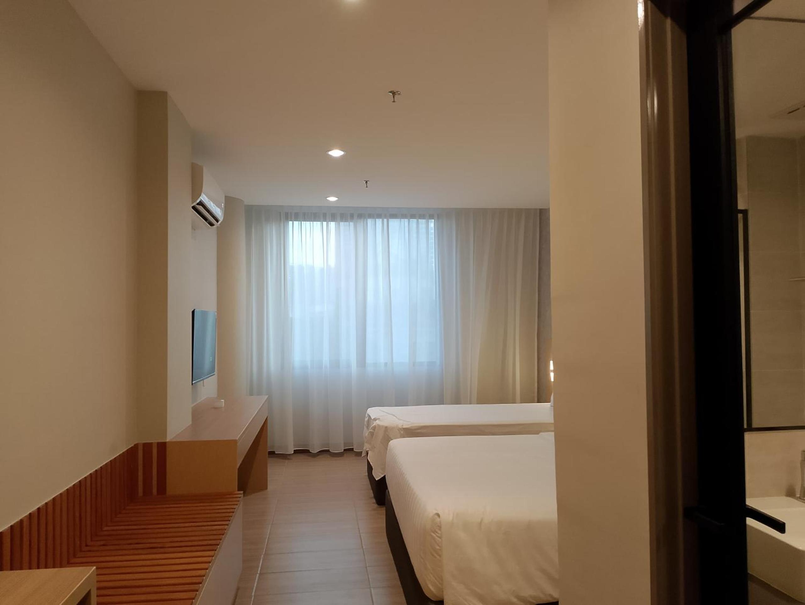 Deluxe Triple Room - Photo 10