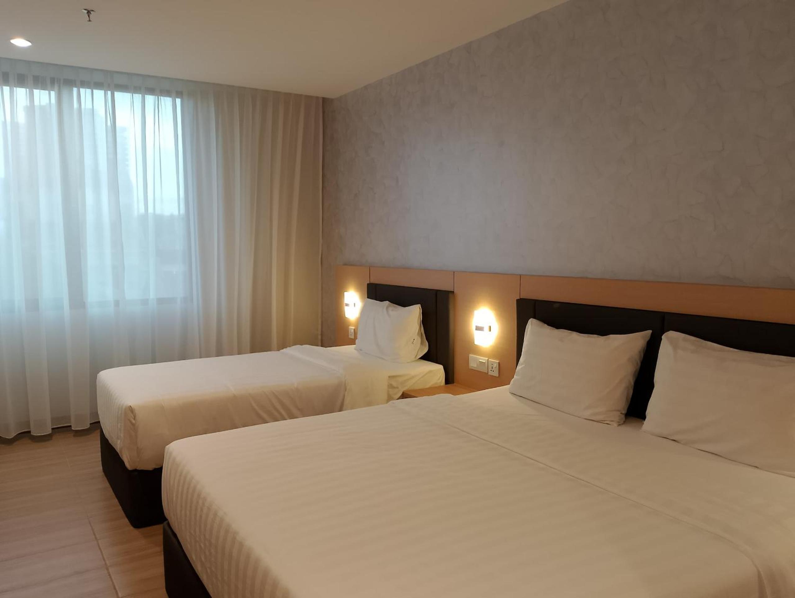 Deluxe Triple Room - Photo 14