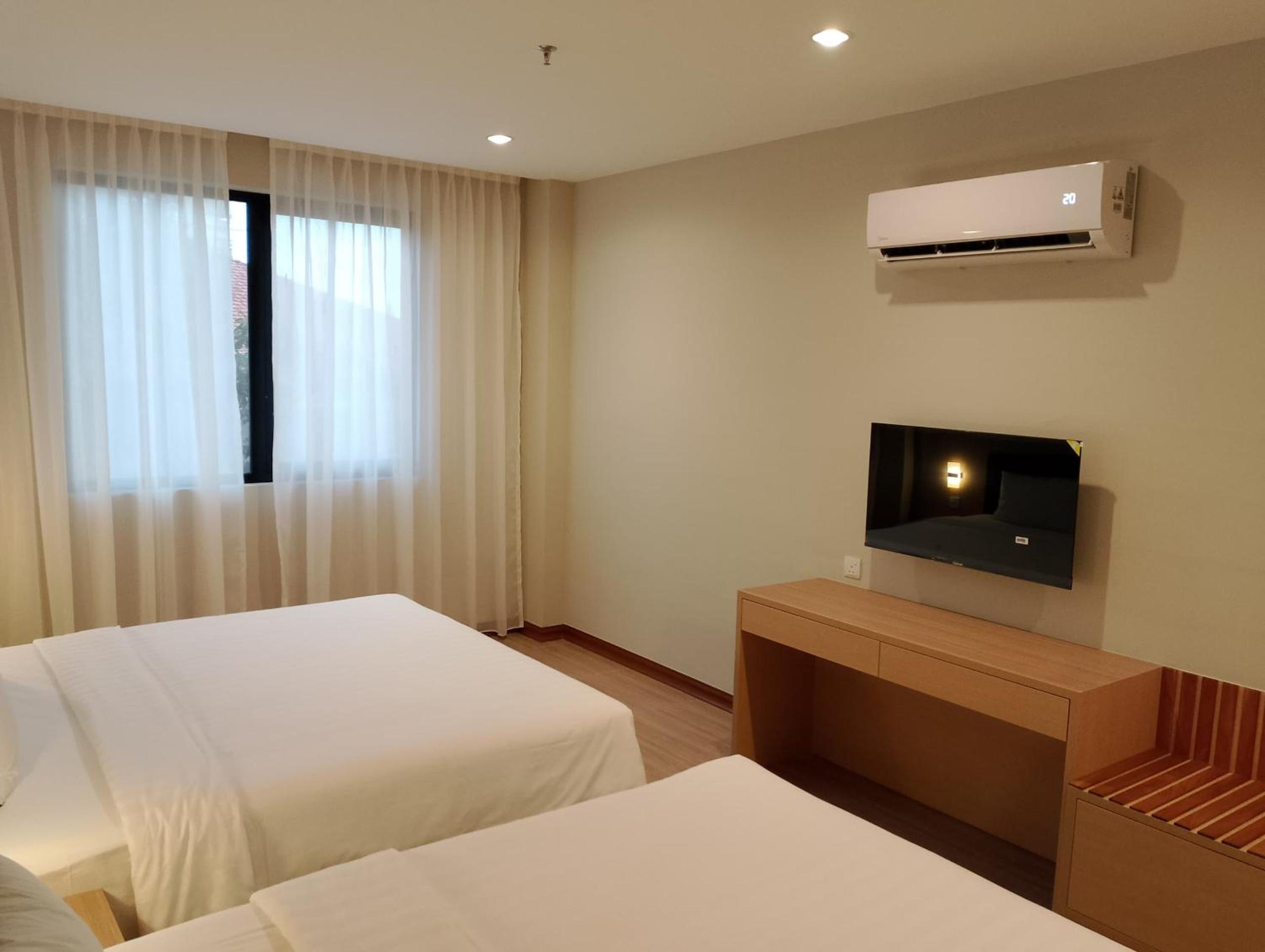 Deluxe Triple Room - Photo 16