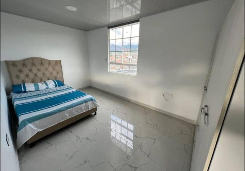 Three-Bedroom Apartment photo 1